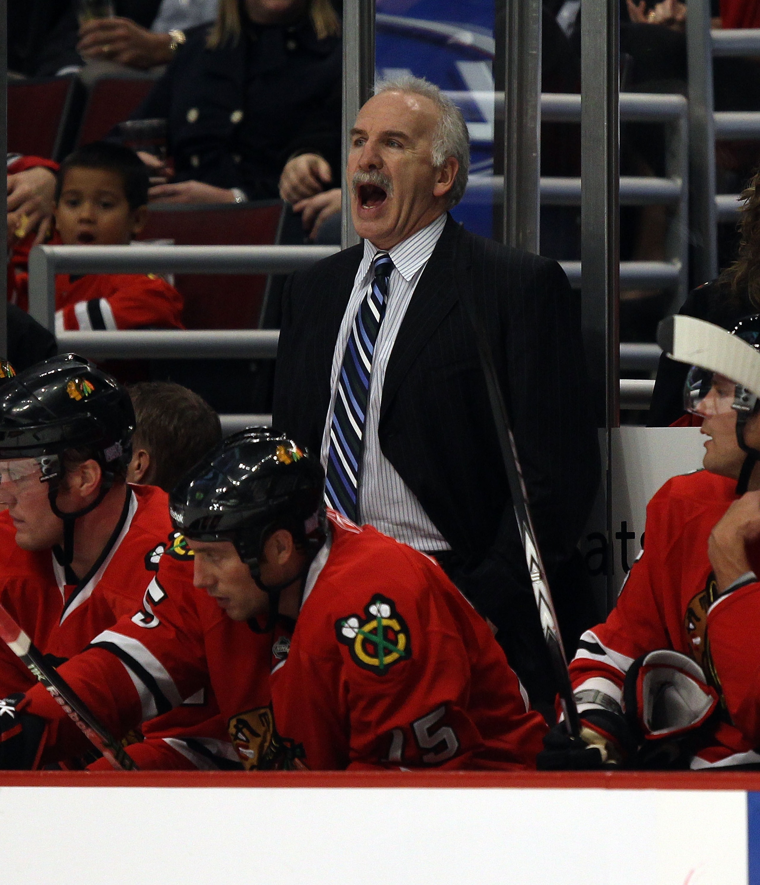 CHICAGO - OCTOBER 27: Head coach Joel Quenneville of the Chicago Blackhawks gives instructions to his team during a game against the Los Angeles Kings at the United Center on October 27, 2010 in Chicago, Illinois. The Blackhawks defeated the Kings 3-1 (Ph