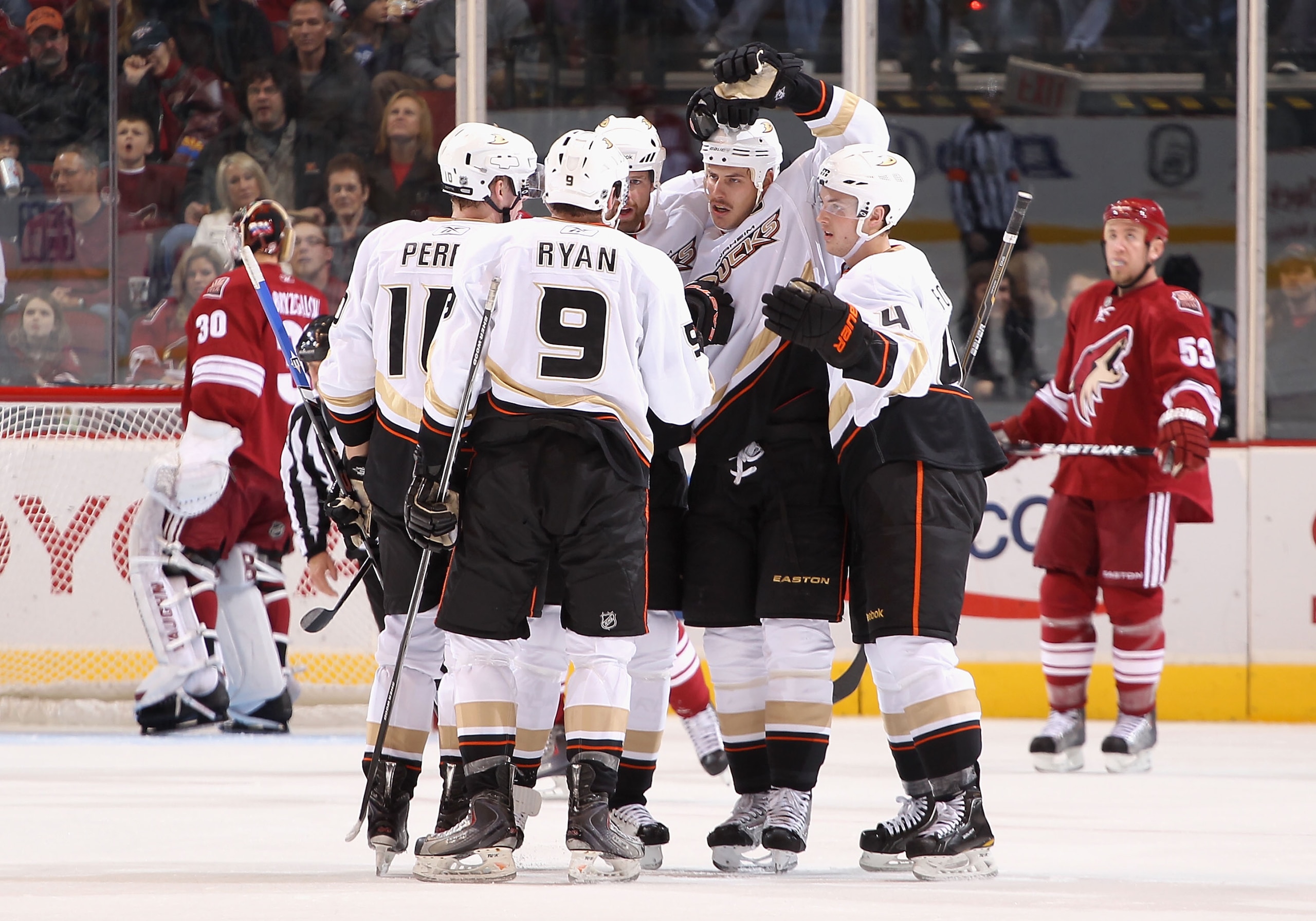 GLENDALE, AZ - NOVEMBER 27:  Bobby Ryan #9 of the Anaheim Ducks celebrates with teammates (L-R) Corey Perry #10, Paul Mara #23, Ryan Getzlaf #15 and Cam Fowler #4 after Ryan scored a second period goal against goaltender Ilya Bryzgalov #30 of the Phoenix