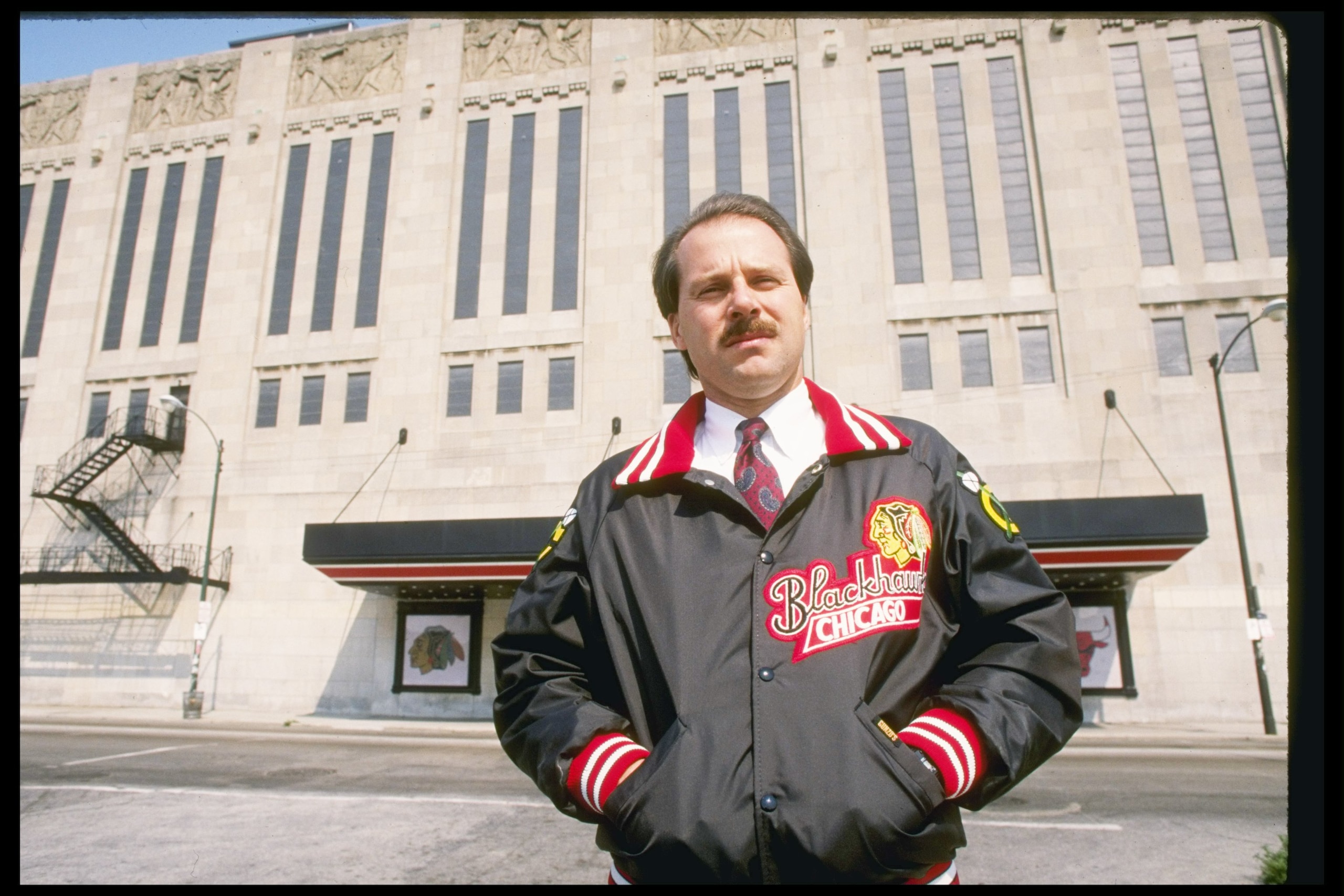 Sep 1988:  Chicago Blackhawks coach Mike Keenan stands in front of Chicago Stadium in Chicago, Illinois. Mandatory Credit: Jonathan Daniel  /Allsport