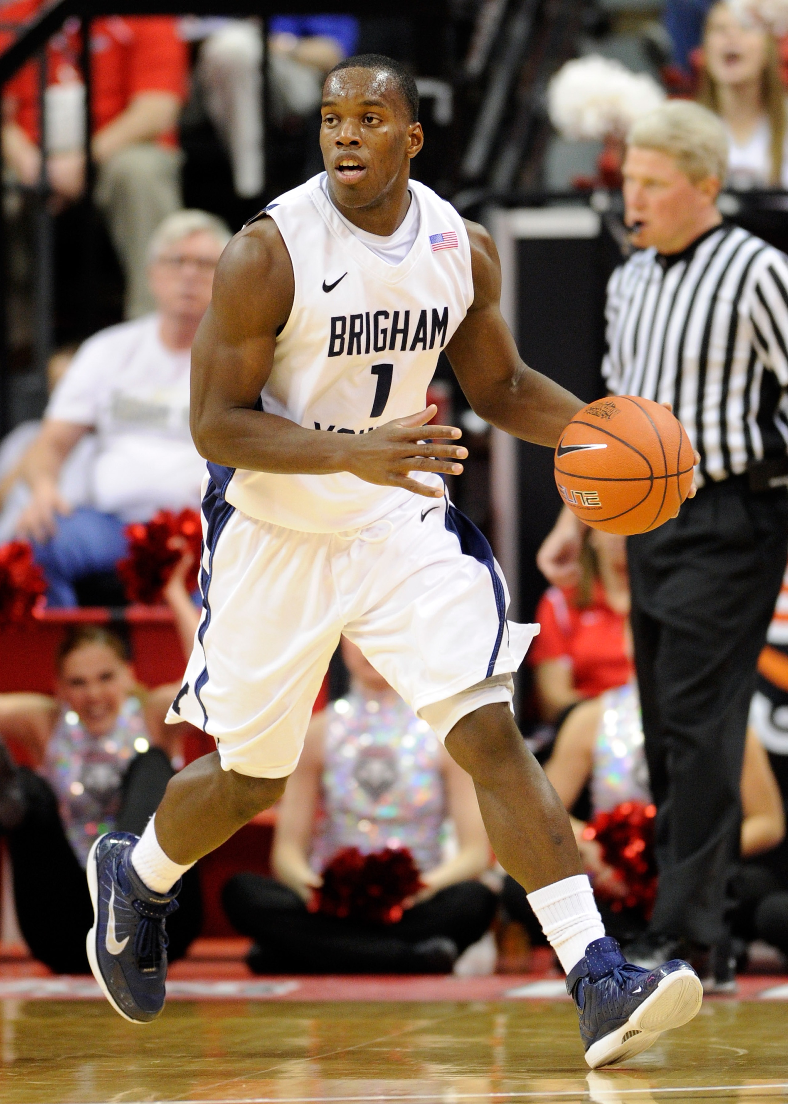 LAS VEGAS, NV - MARCH 11:  Charles Abouo #1 of the Brigham Young University Cougars brings the ball up the court during a semifinal game of the Conoco Mountain West Conference Basketball tournament against the New Mexico Lobos at the Thomas & Mack Center