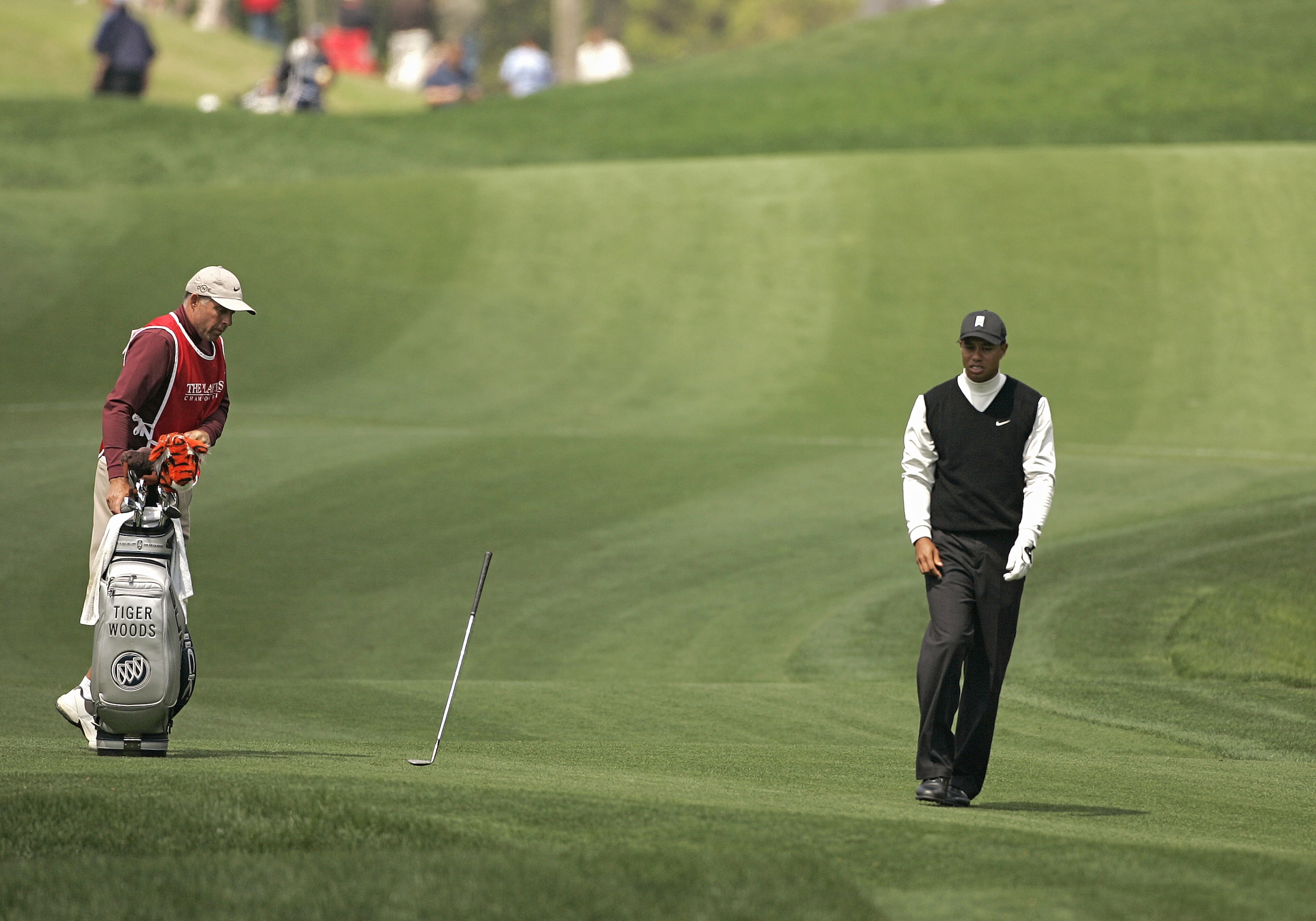 UNITED STATES - MARCH 24:  Tiger Woods reacts by throwing his club after hitting on the fifth fairway during the second round for THE PLAYERS Championship held at the TPC Stadium Course in Ponte Vedra Beach, Florida on March 24, 2006.  (Photo by Michael C