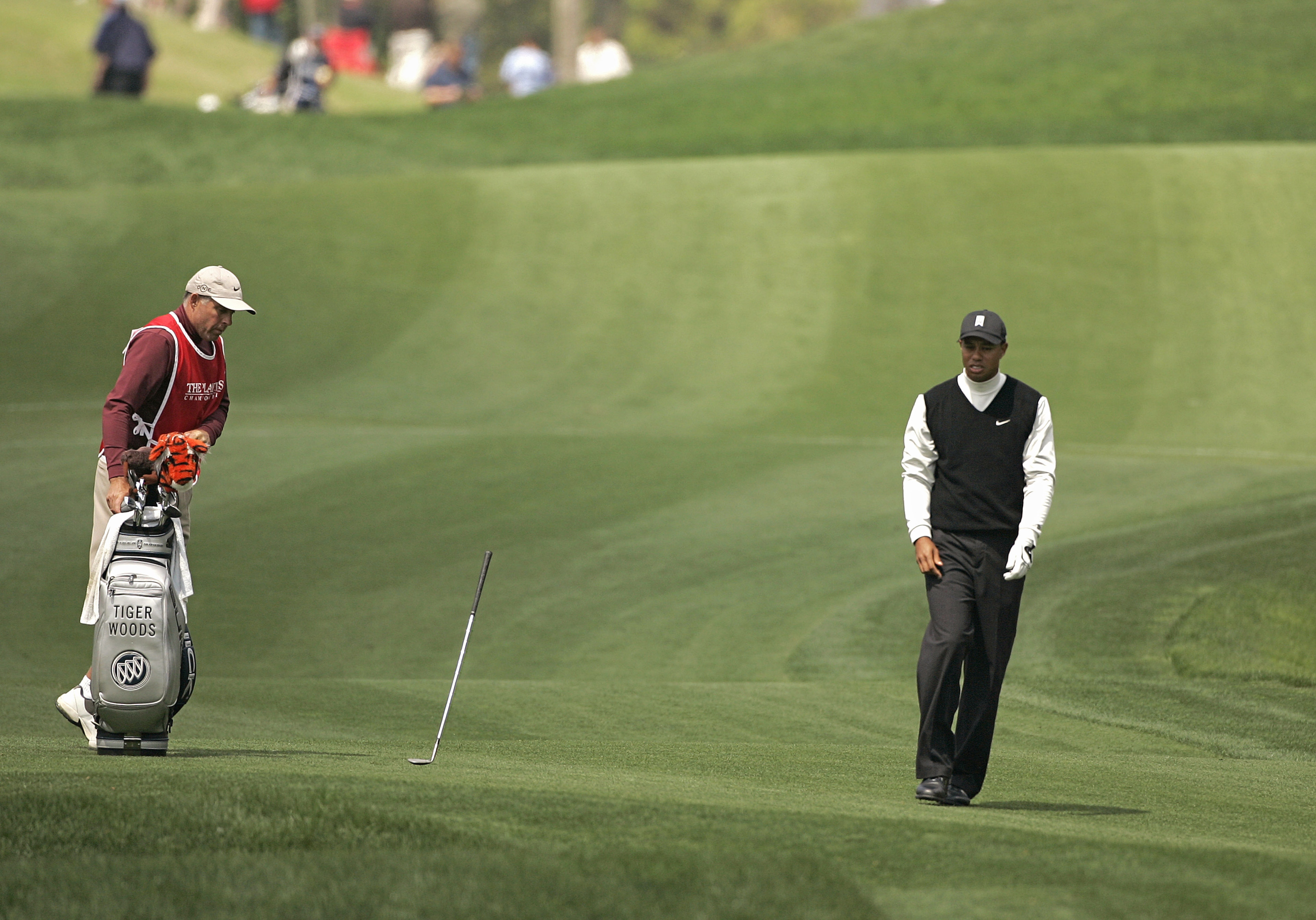UNITED STATES - MARCH 24:  Tiger Woods reacts by throwing his club after hitting on the fifth fairway during the second round for THE PLAYERS Championship held at the TPC Stadium Course in Ponte Vedra Beach, Florida on March 24, 2006.  (Photo by Michael C