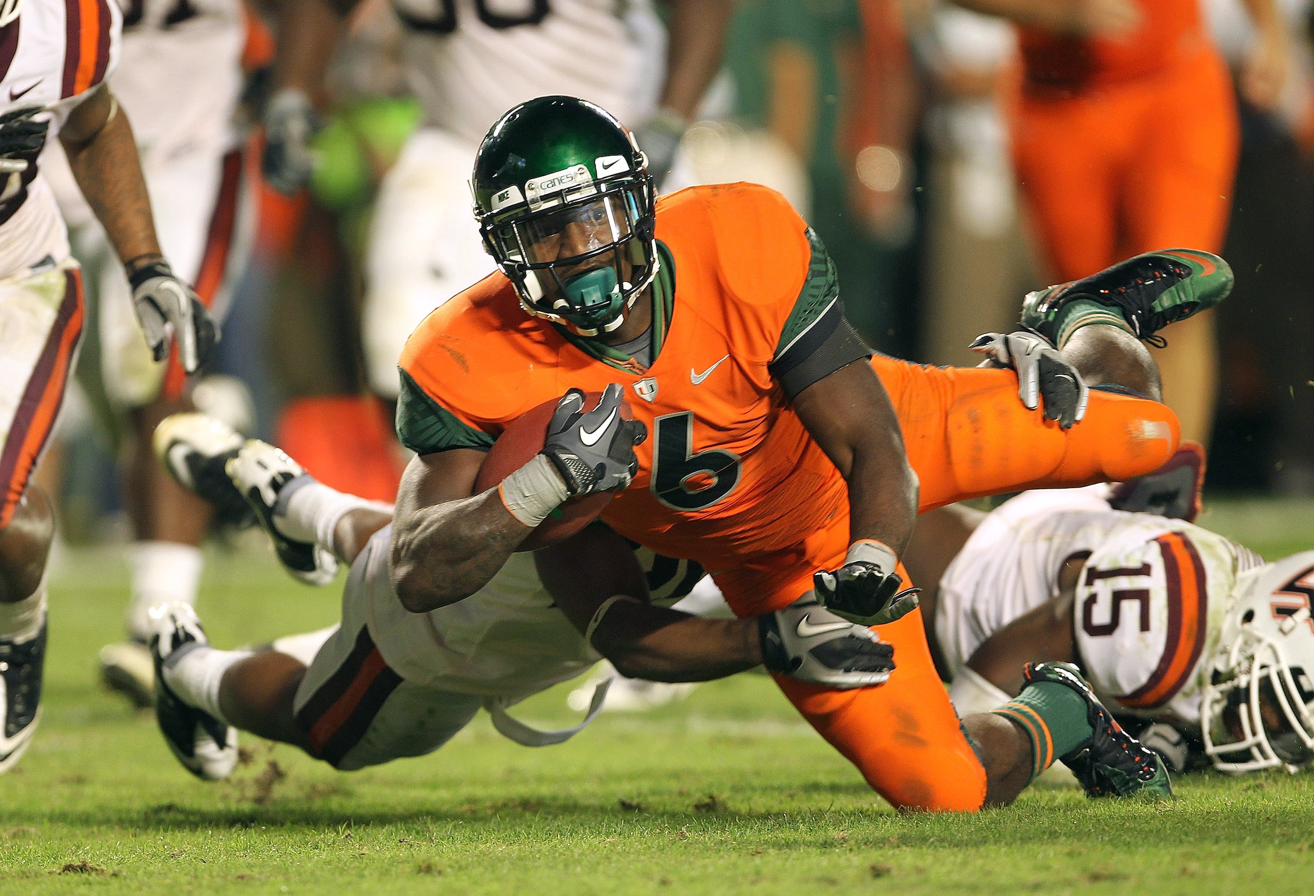 MIAMI - NOVEMBER 20:  Lamar Miller #6 of the Miami Hurricanes runs for a touchdown during a game against the Virginia Tech Hokies at Sun Life Stadium on November 20, 2010 in Miami, Florida.  (Photo by Mike Ehrmann/Getty Images)
