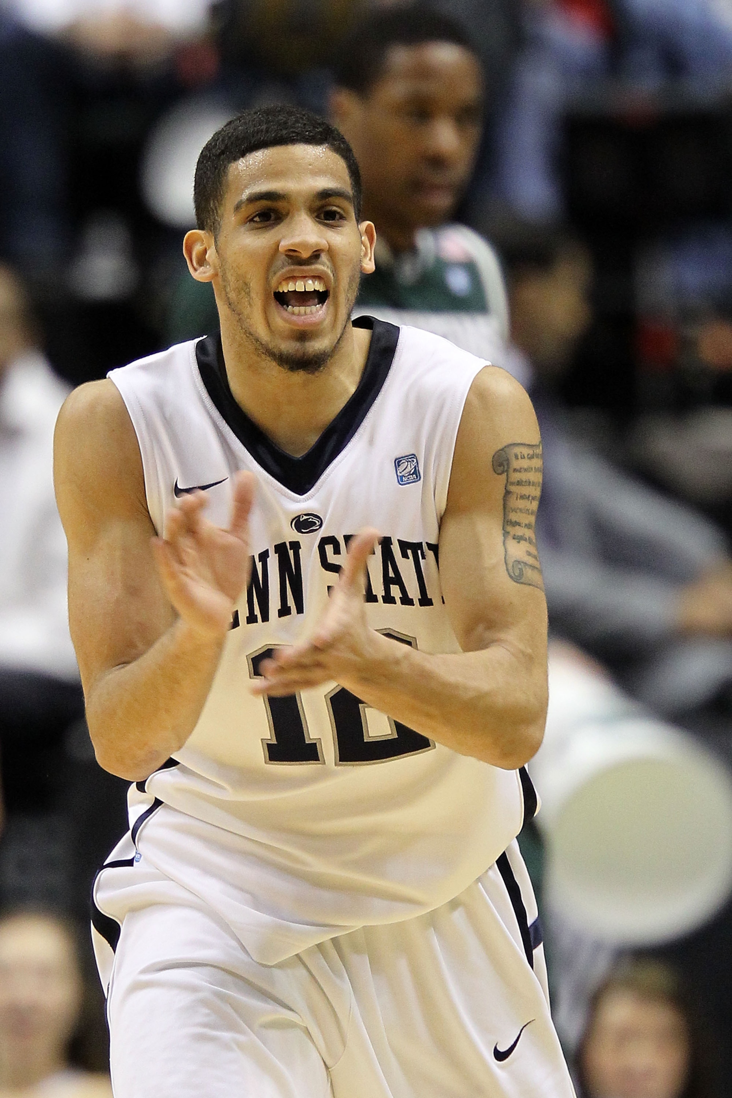 INDIANAPOLIS, IN - MARCH 12:  Talor Battle #12 of the Penn State Nittany Lions reacts to a play against the Michigan State Spartans during the semifinals of the 2011 Big Ten Men's Basketball Tournament at Conseco Fieldhouse on March 12, 2011 in Indianapol