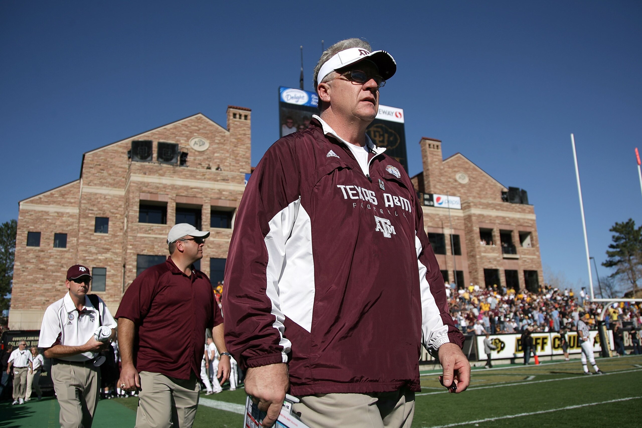 BOULDER, CO - NOVEMBER 07:  Head coach Mike Sherman of the Texas A&M Aggies enters the field for the second half as he leads his team against the Colorado Buffaloes during NCAA college football action at Folsom Field on November 7, 2009 in Boulder, Colora