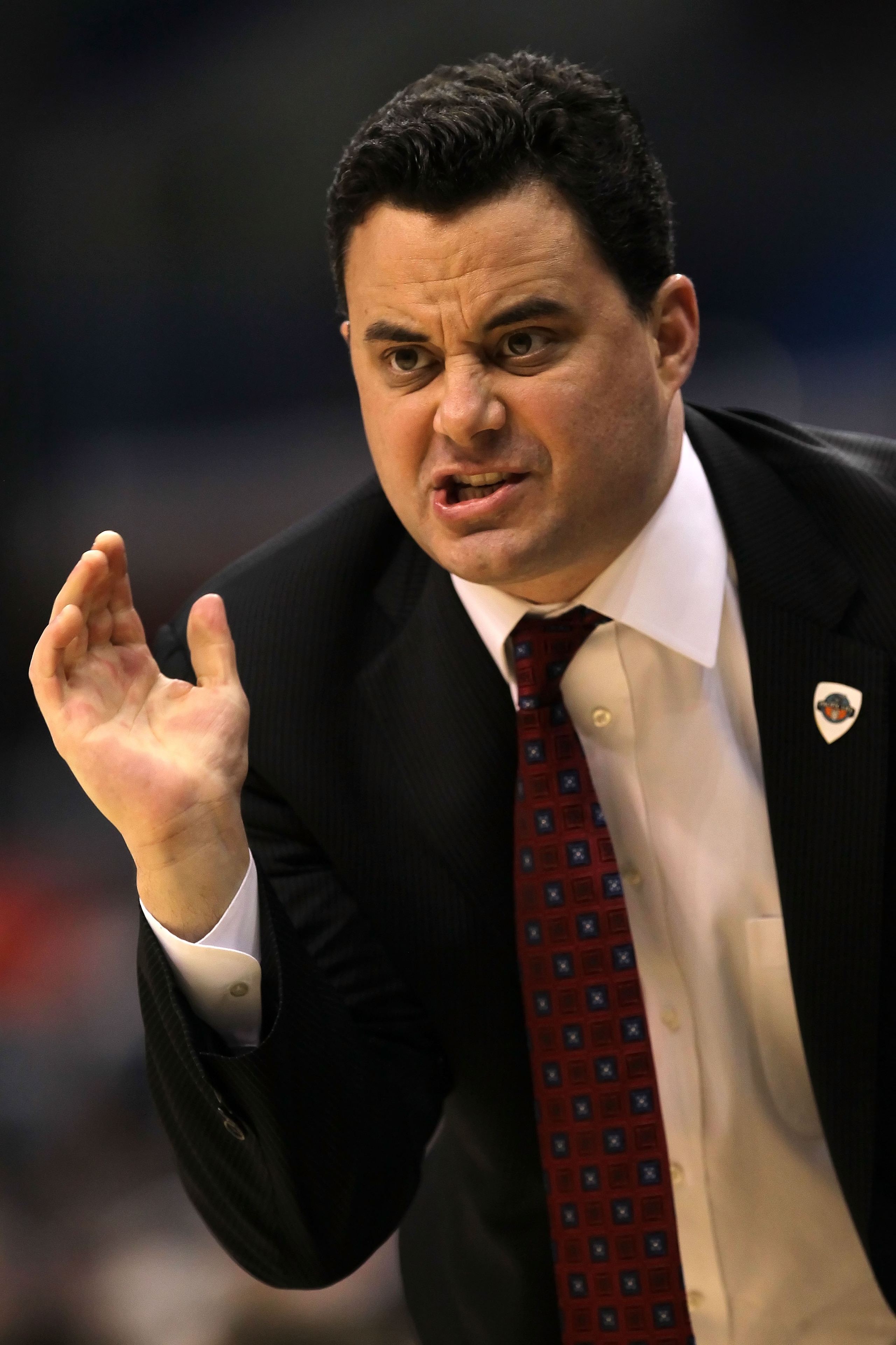LOS ANGELES, CA - MARCH 12:  Head coach Sean Miller of the Arizona Wildcats reacts in the first half while taking on the Washington Huskies in the championship game of the 2011 Pacific Life Pac-10 Men's Basketball Tournament at Staples Center on March 12,