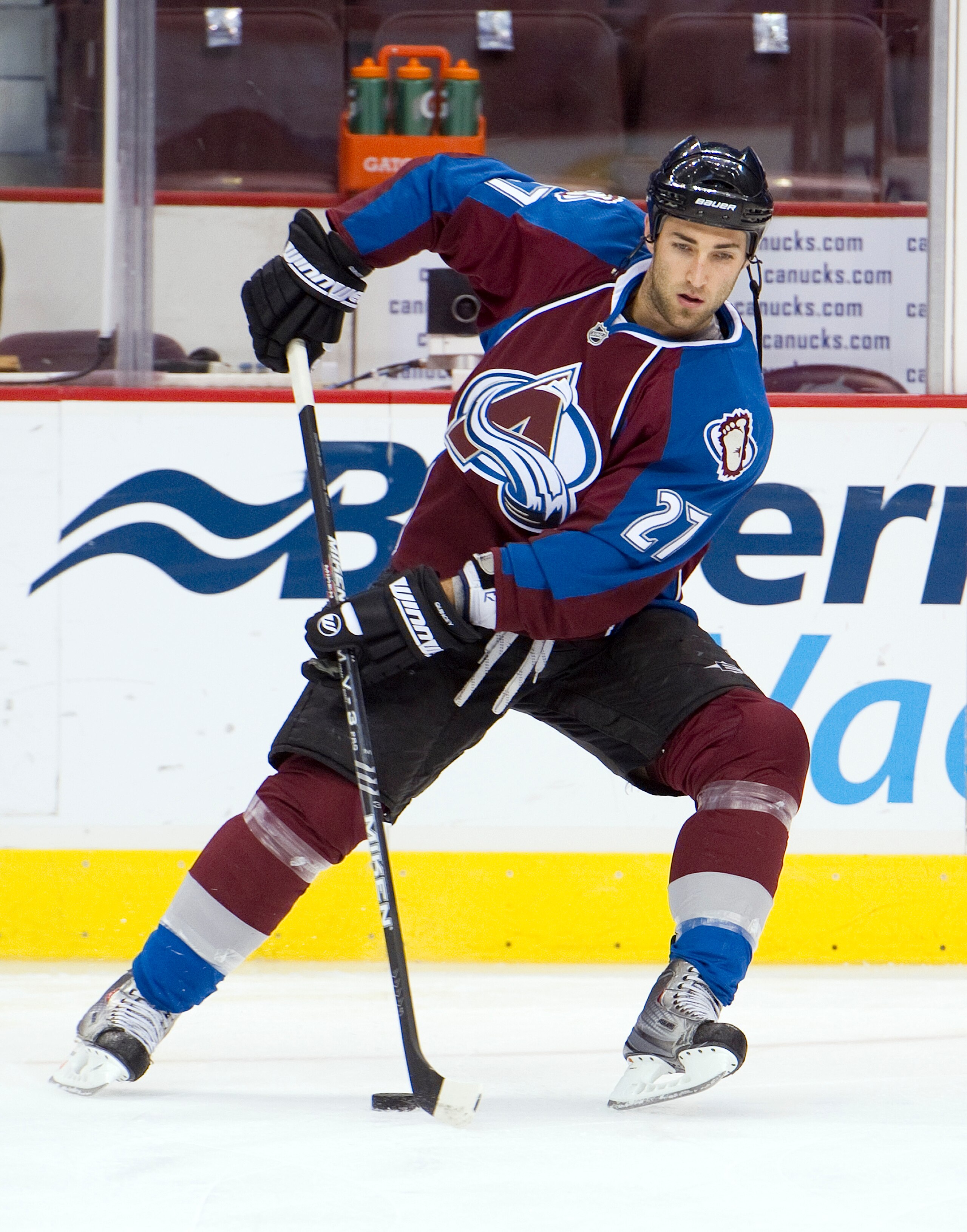 VANCOUVER, CANADA - OCTOBER 26: Kyle Quincey #27 of the Colorado Avalanche handles the puck during the pre-game skate prior to NHL action against the Vancouver Canucks on October 26, 2010 at Rogers Arena in Vancouver, British Columbia, Canada.  (Photo by