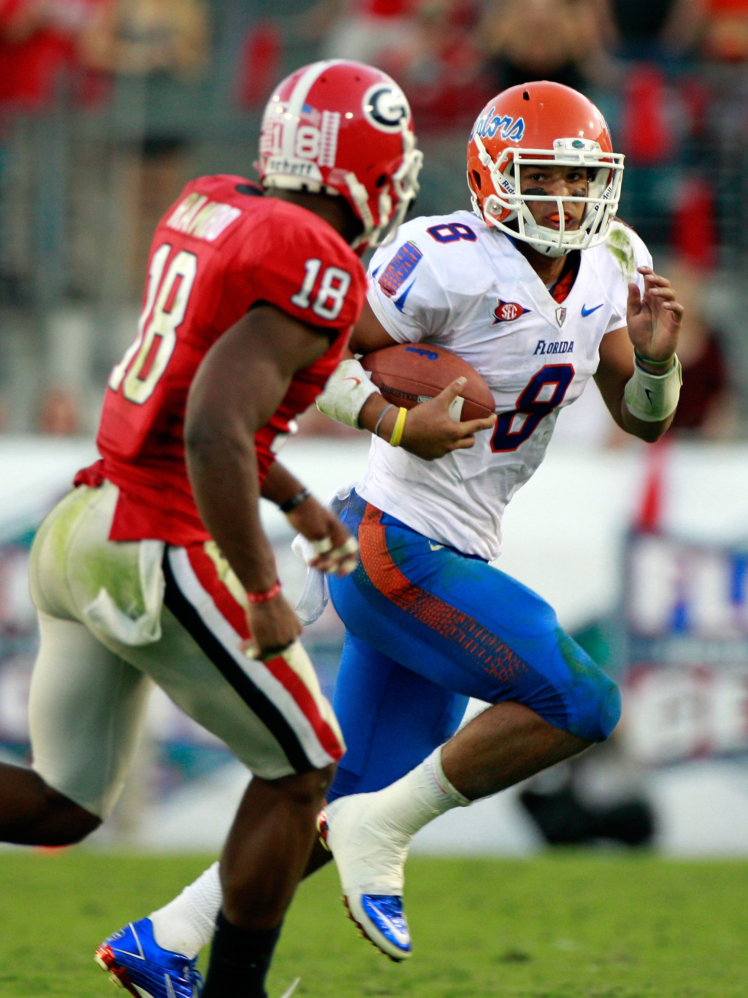 JACKSONVILLE, FL - OCTOBER 30:  Trey Burton #8 of the Florida Gators attempts to run past Bacarri Rambo#18 of the Georgia Bulldogs during the game at EverBank Field on October 30, 2010 in Jacksonville, Florida.  (Photo by Sam Greenwood/Getty Images)