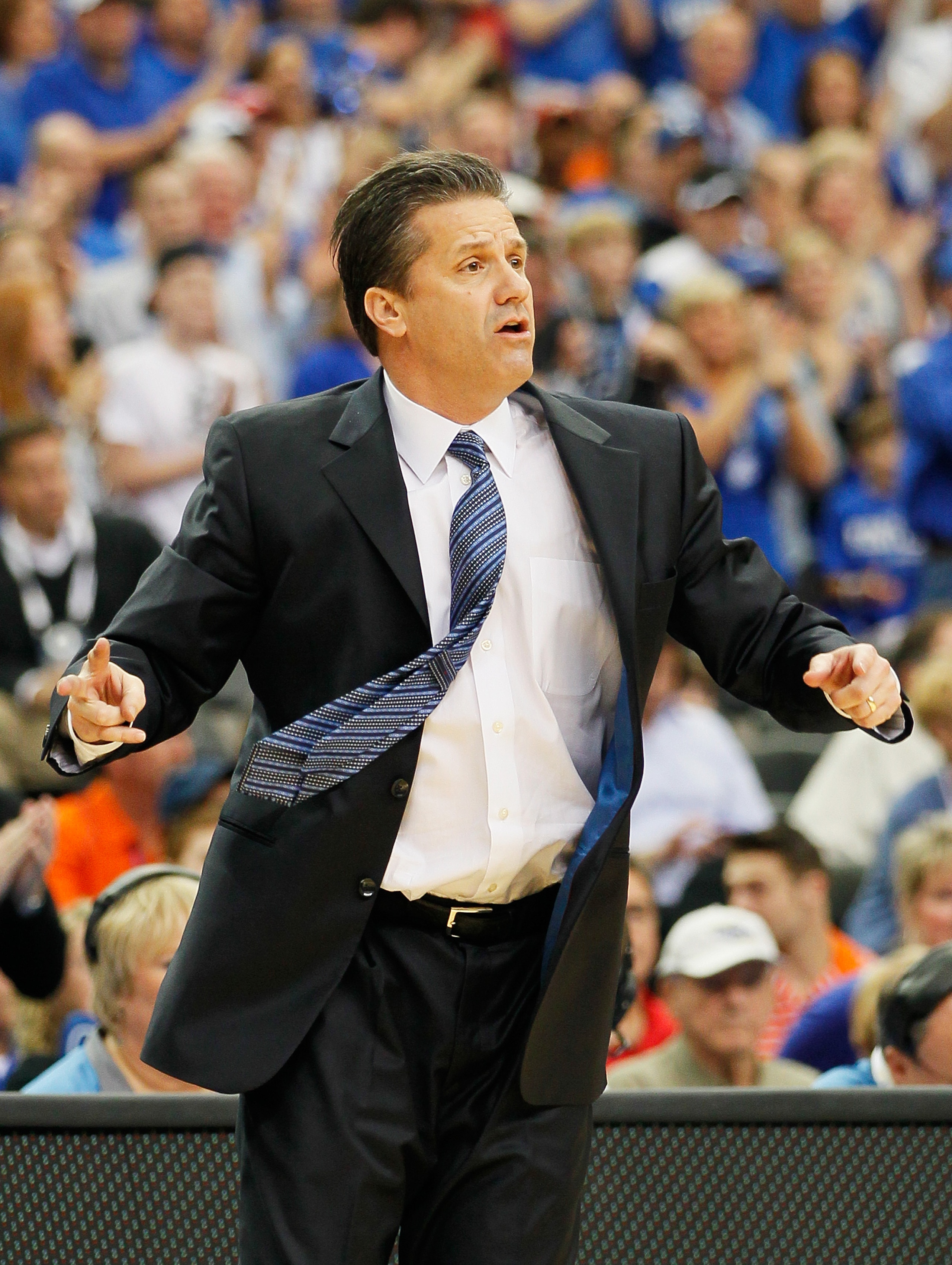 ATLANTA, GA - MARCH 13:  Head coach John Calipari of the Kentucky Wildcats coaches against the Florida Gators during the championship game of the SEC Men's Basketball Tournament at Georgia Dome on March 13, 2011 in Atlanta, Georgia.  (Photo by Kevin C. Co