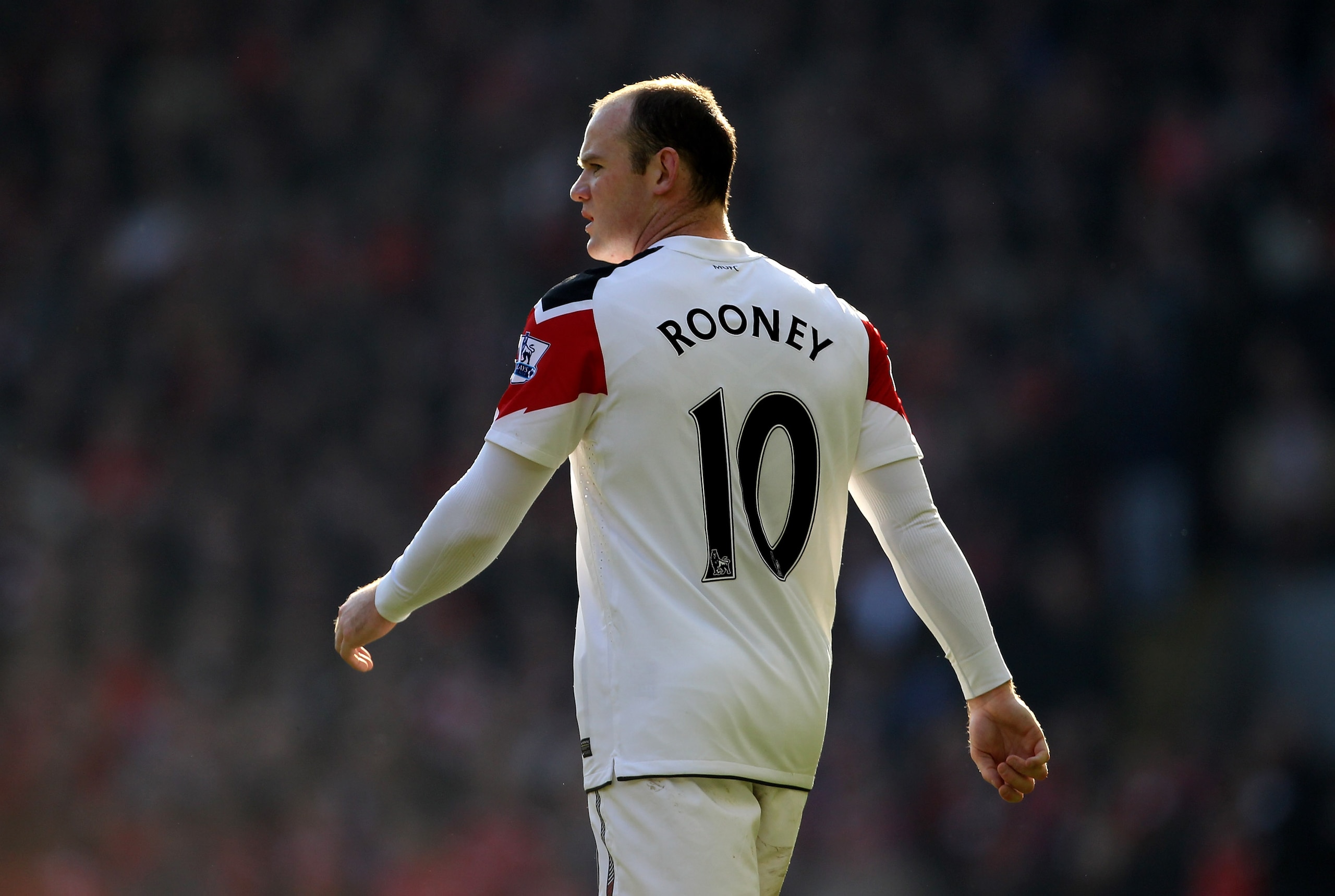 LIVERPOOL, ENGLAND - MARCH 06:  Wayne Rooney of Manchester United looks on during the Barclays Premier League match between Liverpool and Manchester United at Anfield on March 6, 2011 in Liverpool, England.  (Photo by Alex Livesey/Getty Images)