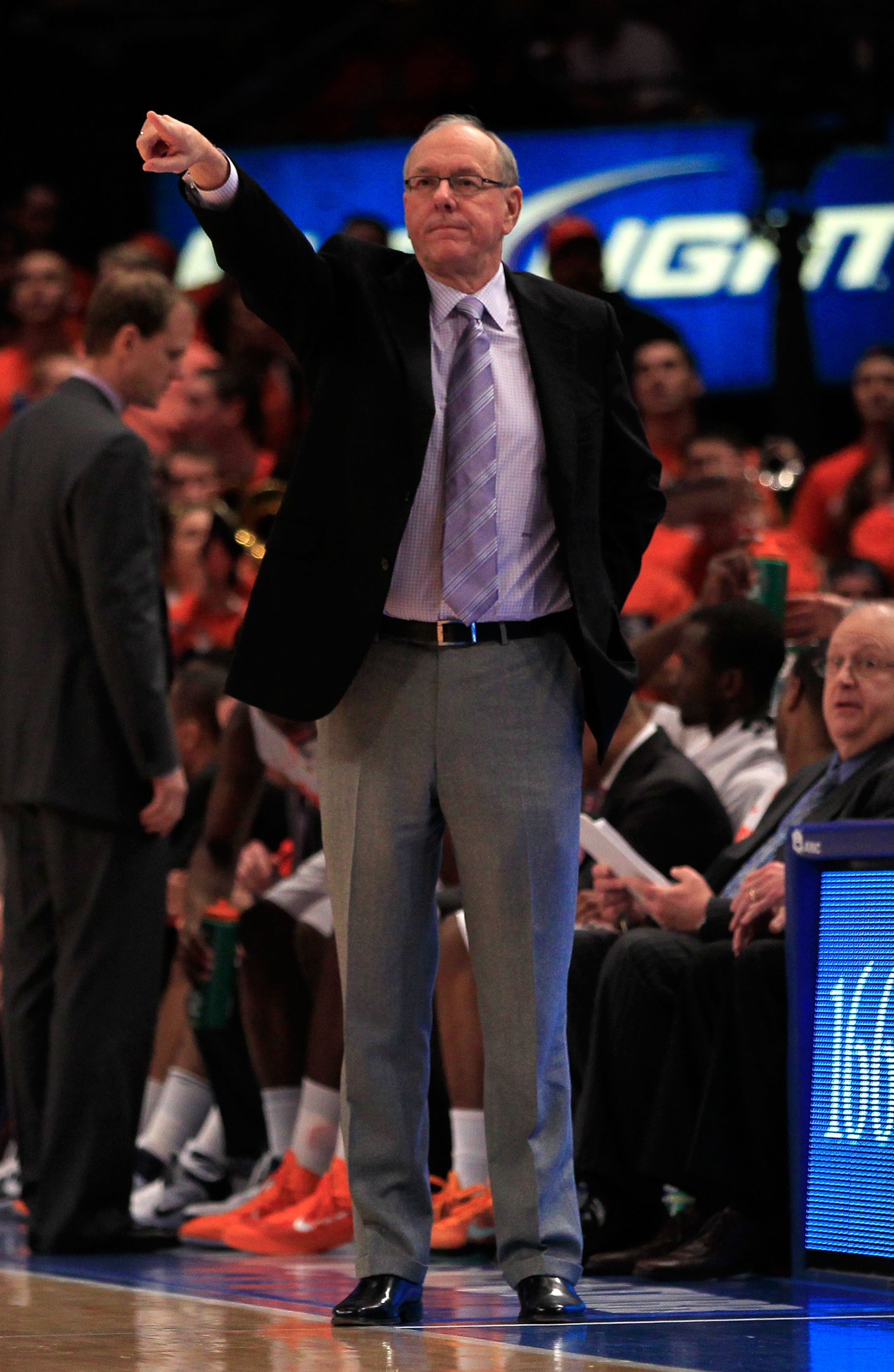 NEW YORK, NY - MARCH 11: Head coach Jim Boeheim of the Syracuse Orange gestures from the bench during the game against the Connecticut Huskies during the semifinals of the 2011 Big East Men's Basketball Tournament presented by American Eagle Outfitters at