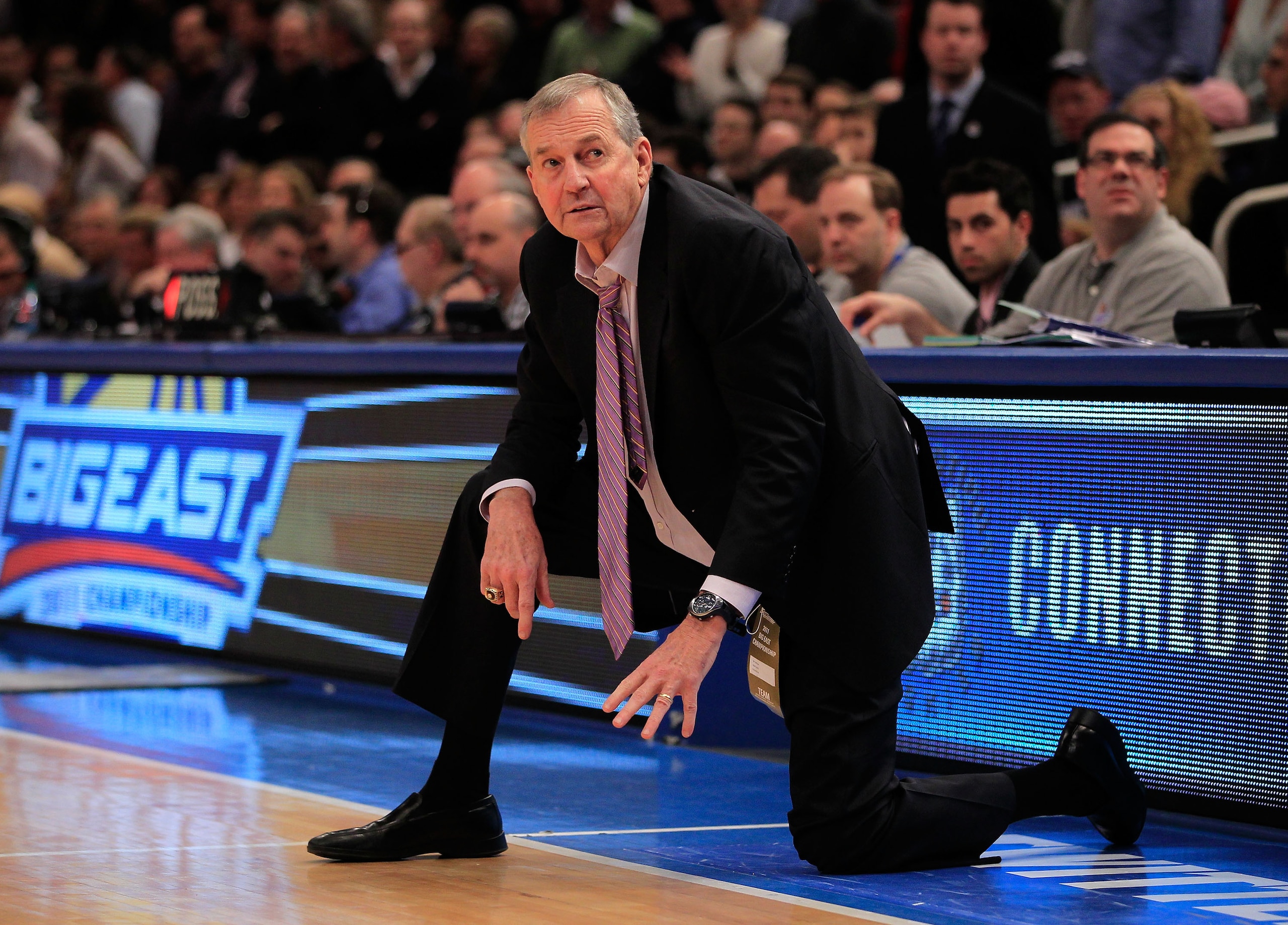 NEW YORK, NY - MARCH 12: Head coach Jim Calhoun of the Connecticut Huskies looks on from the bench late in the game against the Louisville Cardinals during the championship of the 2011 Big East Men's Basketball Tournament presented by American Eagle Outfi
