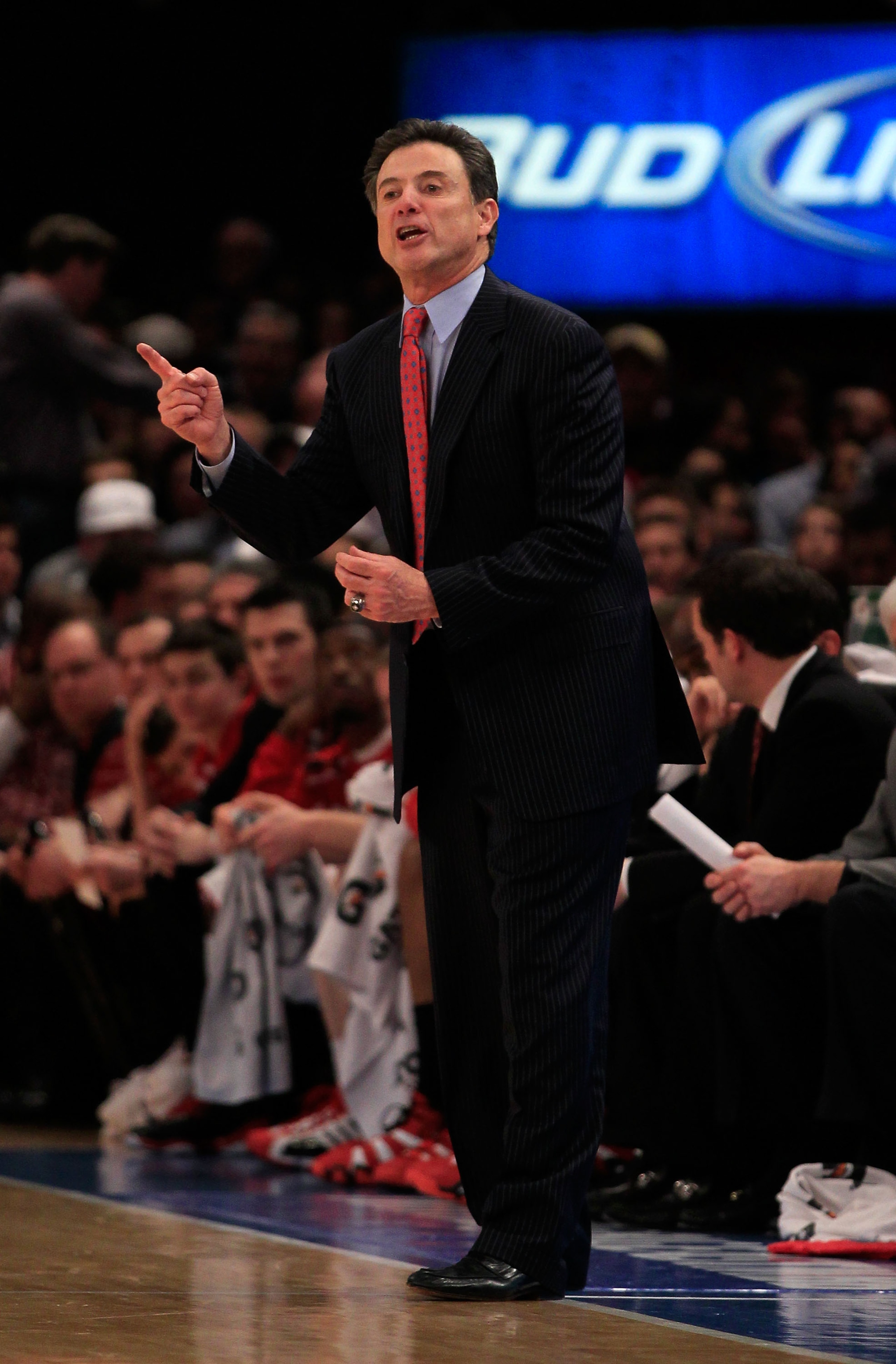 NEW YORK, NY - MARCH 12: Head coach Rick Pitino of the Louisville Cardinals reacts from the bench during the game against the Connecticut Huskies during the championship of the 2011 Big East Men's Basketball Tournament presented by American Eagle Outfitte