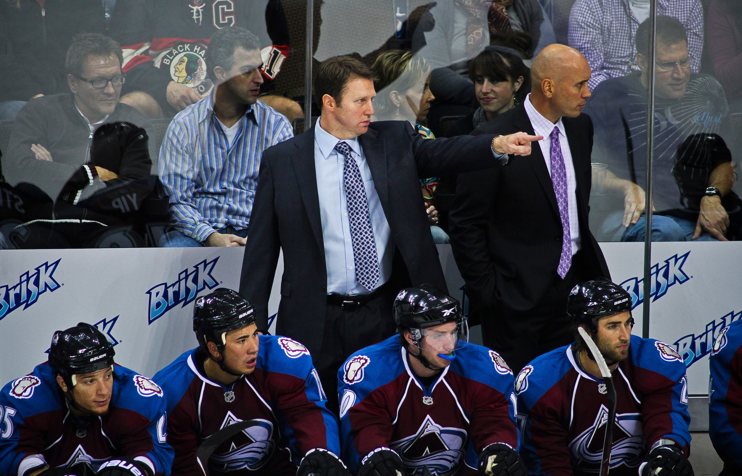 DENVER, CO - OCTOBER 7: Colorado Avalanche head coach Joe Sacco makes a few adjustments from behind the bench against the Chicago Blackhawks during both team's season openers at the Pepsi Center on October 7, 2010 in Denver, Colorado. The Avalanche won th