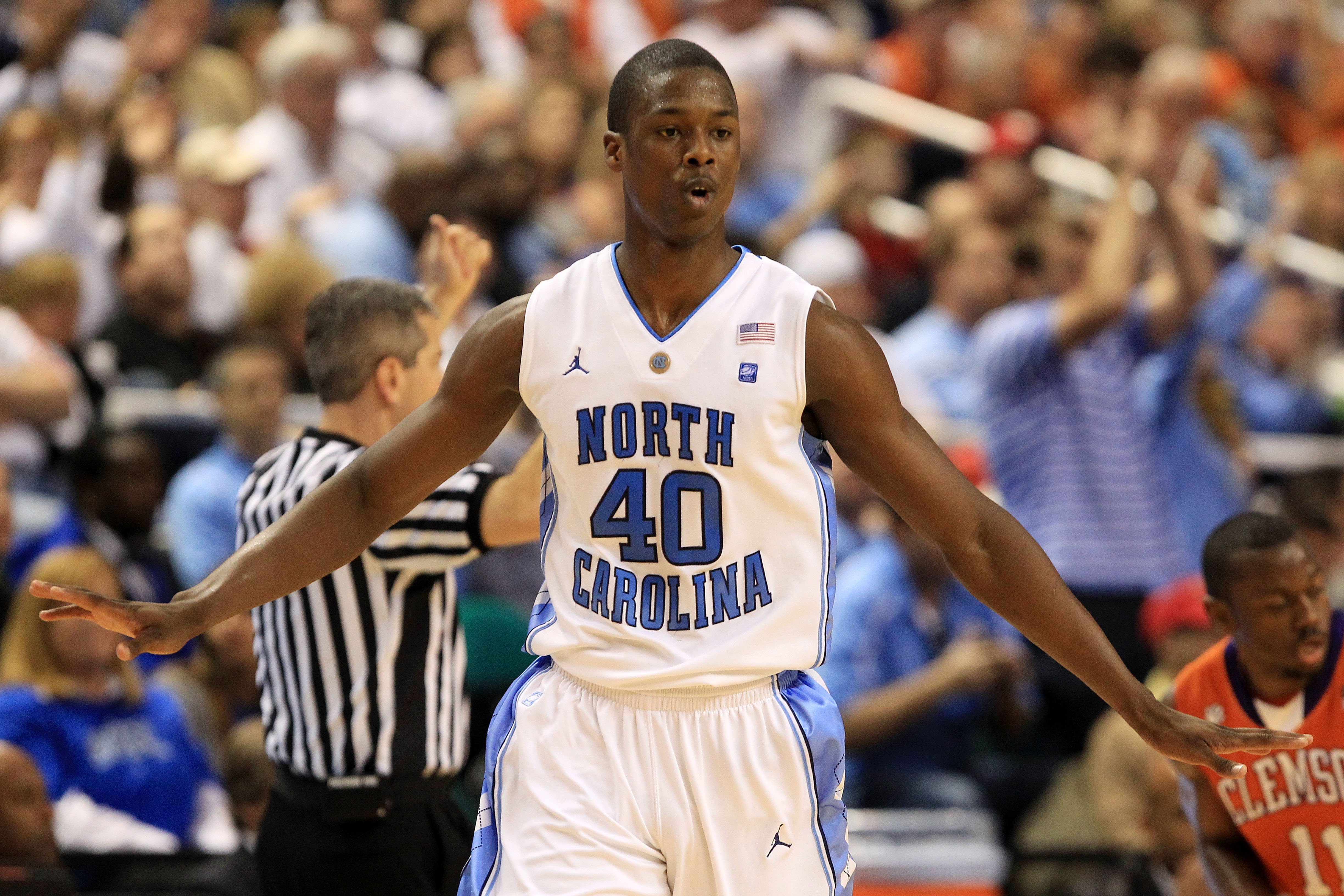 GREENSBORO, NC - MARCH 12:  Harrison Barnes #40 of the North Carolina Tar Heels reacts while playing against the Clemson Tigers in the semifinals of the 2011 ACC men's basketball tournament at the Greensboro Coliseum on March 12, 2011 in Greensboro, North