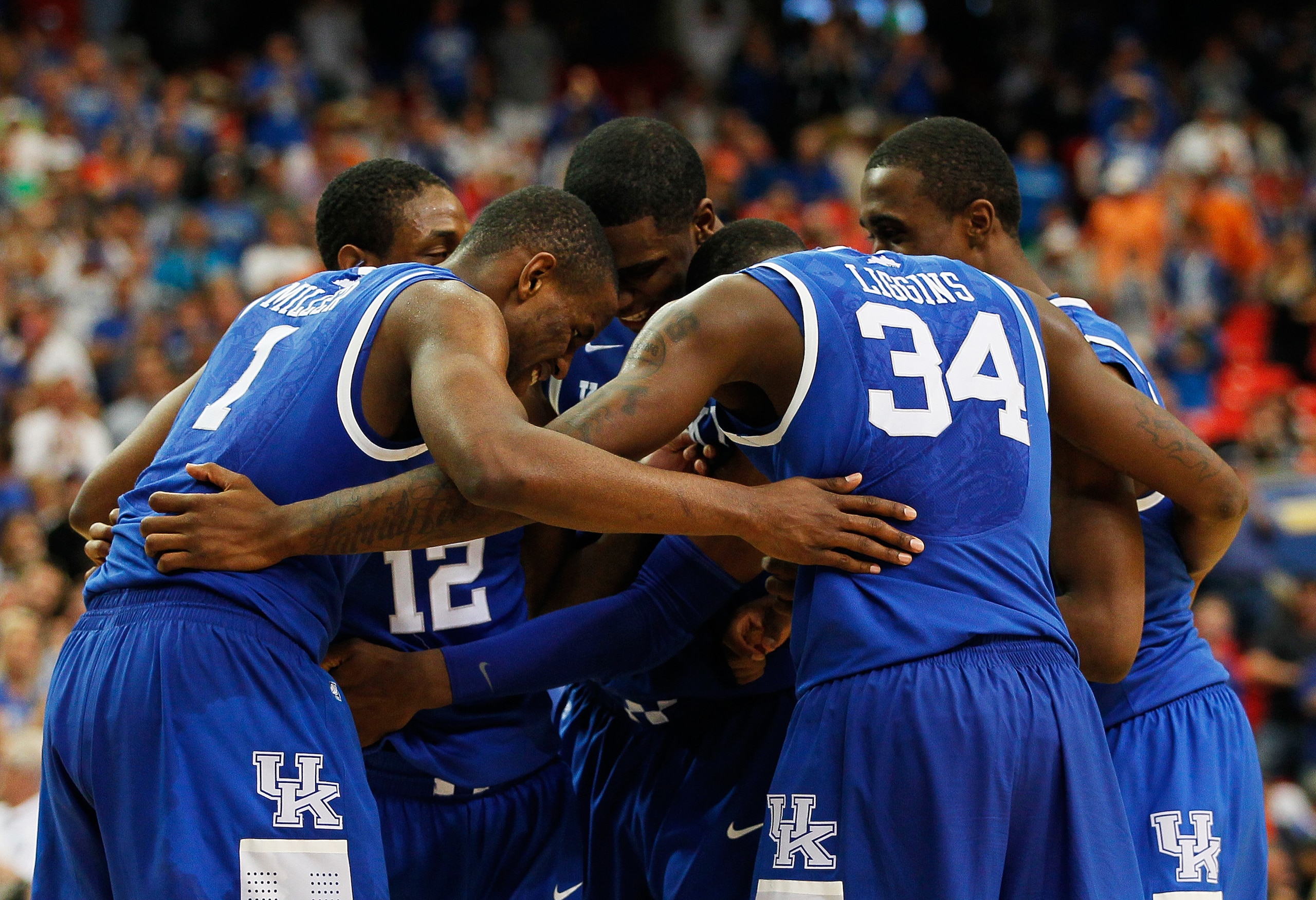 ATLANTA, GA - MARCH 13:  The Kentucky Wildcats huddle during their 70 to 54 win over the Florida Gators in the championship game of the SEC Men's Basketball Tournament at Georgia Dome on March 13, 2011 in Atlanta, Georgia.  (Photo by Kevin C. Cox/Getty Im