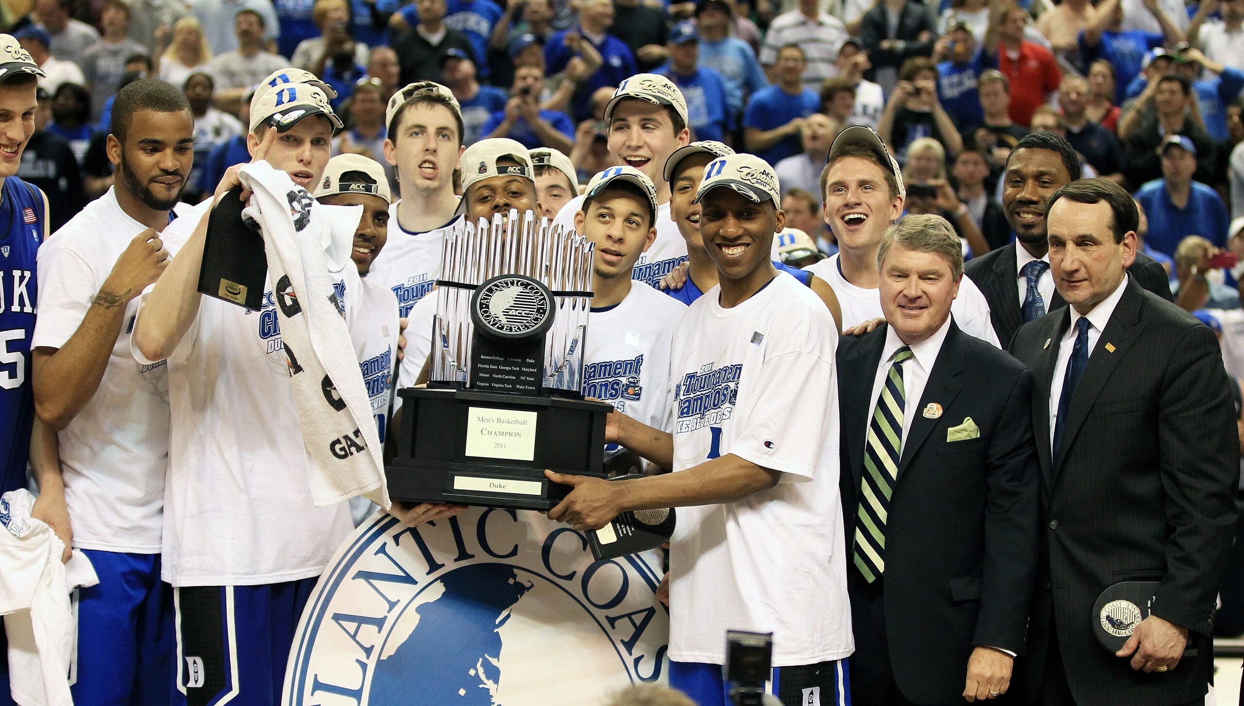 GREENSBORO, NC - MARCH 13:  The Duke Blue Devils celebrate with the ACC Championship Trophy after their 75-58 victory over the North Carolina Tar Heels in the championship game of the 2011 ACC men's basketball tournament at the Greensboro Coliseum on Marc