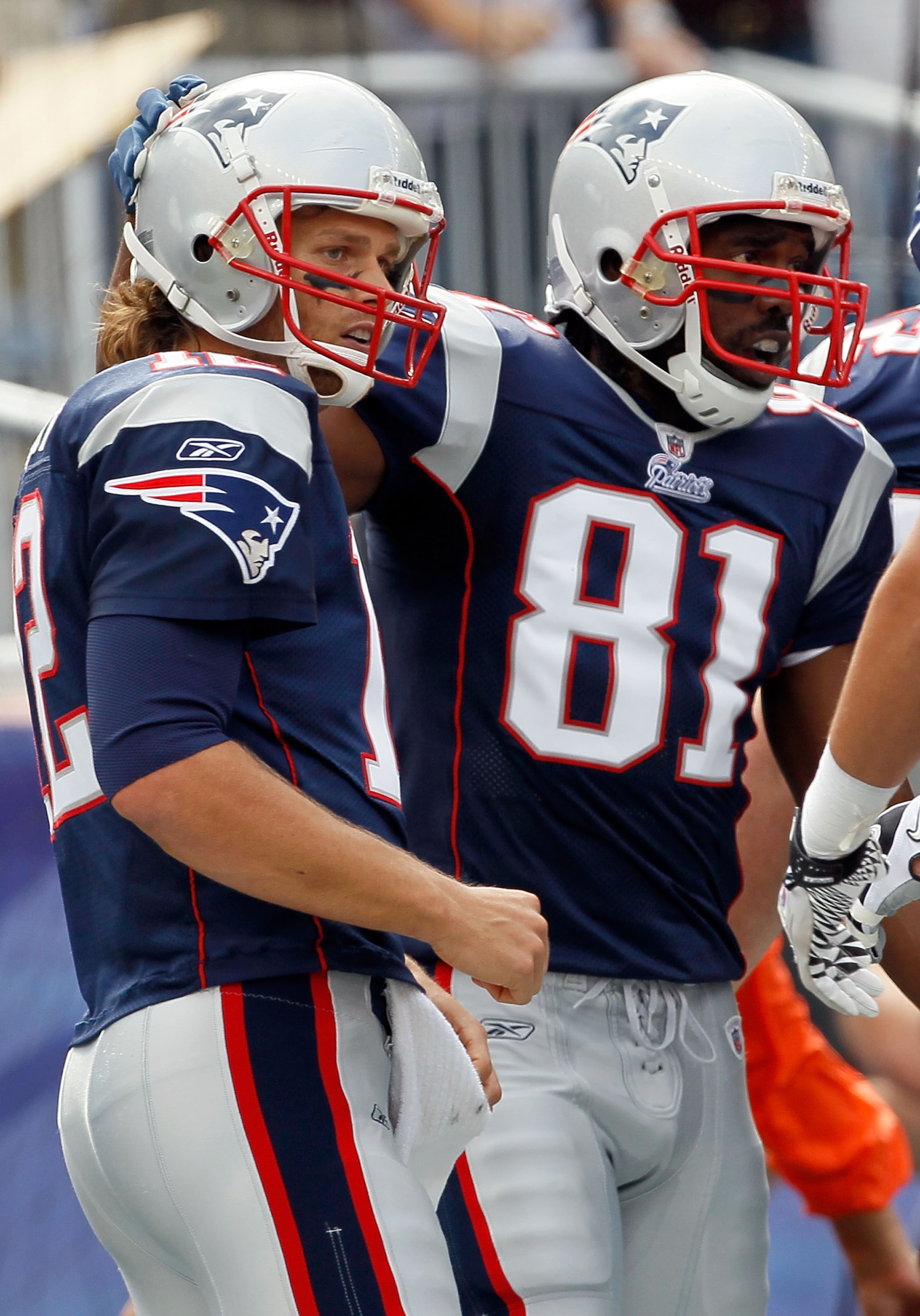 FOXBORO, MA - SEPTEMBER 26: Tom Brady #12 of the New England Patriots celebrates with Randy Moss #81 after Moss made a touchdown catch against the Buffalo Bills at Gillette Stadium on September 26, 2010 in Foxboro, Massachusetts. (Photo by Jim Rogash/Ge FOXBORO, MA - SEPTEMBER 26: Tom Brady #12 of the New England Patriots celebrates with Randy Moss #81 after Moss made a touchdown catch against the Buffalo Bills at Gillette Stadium on September 26, 2010 in Foxboro, Massachusetts. (Photo by Jim Rogash/Ge