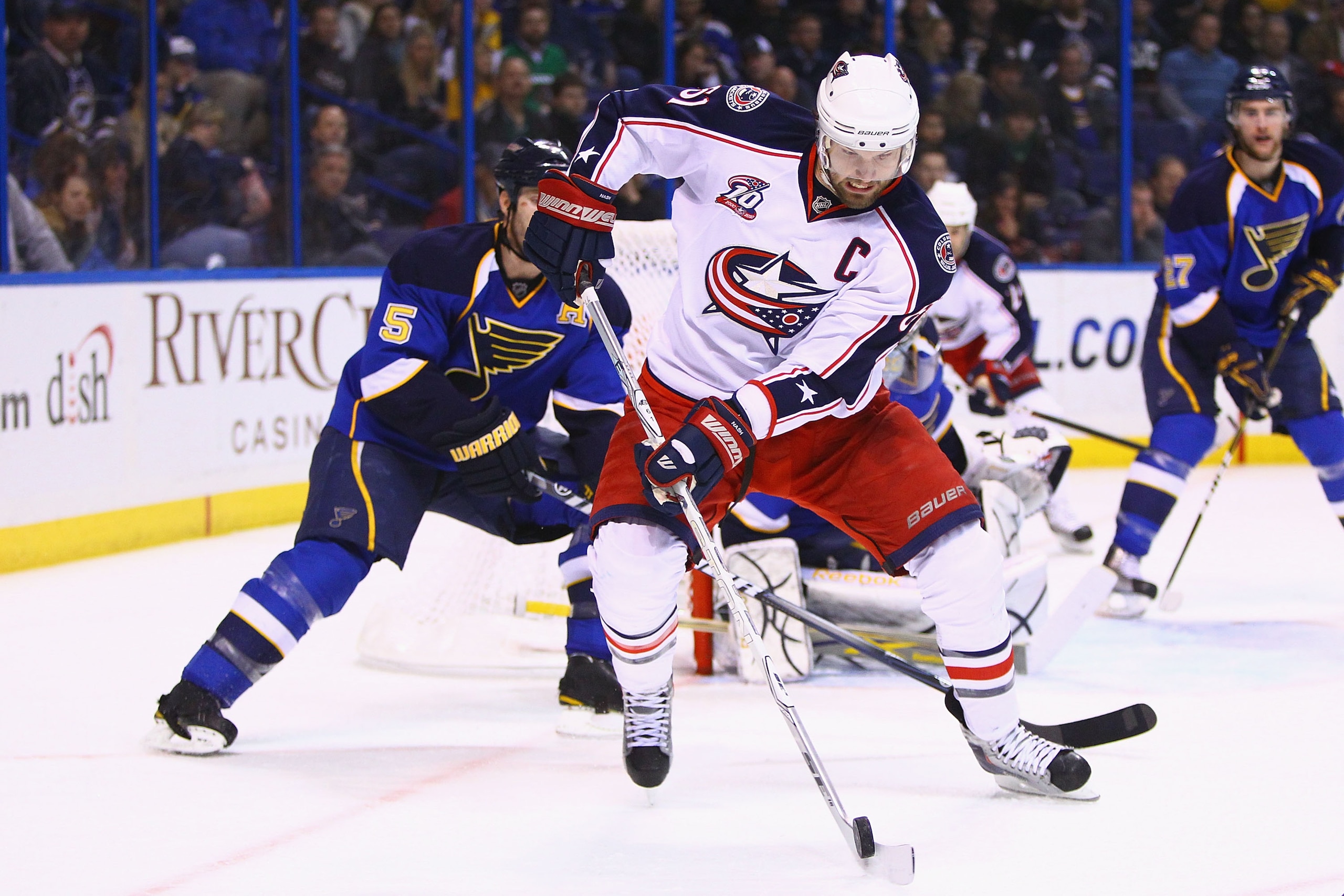ST. LOUIS, MO - MARCH 7: Rick Nash #61 of the Columbus Blue Jackets controls the puck against the St. Louis Blues at the Scottrade Center on March 7, 2011 in St. Louis, Missouri.  (Photo by Dilip Vishwanat/Getty Images)