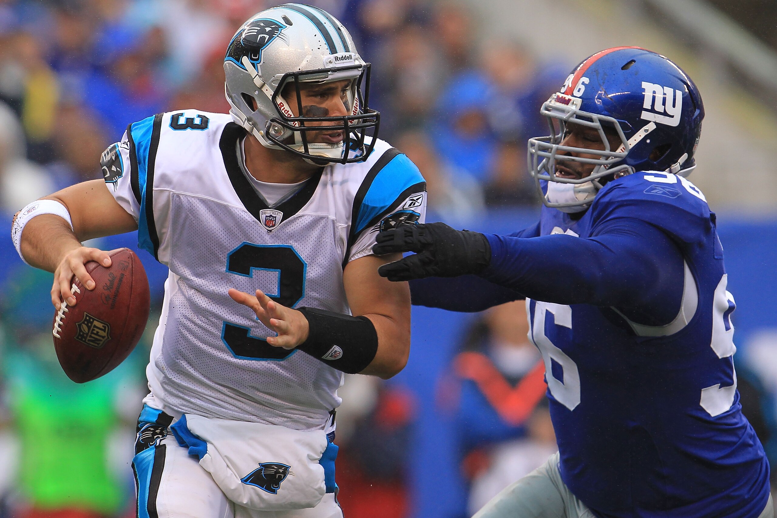 EAST RUTHERFORD, NJ - SEPTEMBER 12:  Matt Moore #3 of the Carolina Panthers is sacked by Barry Cofield #96 of the New York Giants during the NFL season opener at New Meadowlands Stadium on September 12, 2010 in East Rutherford, New Jersey.  (Photo by Chri
