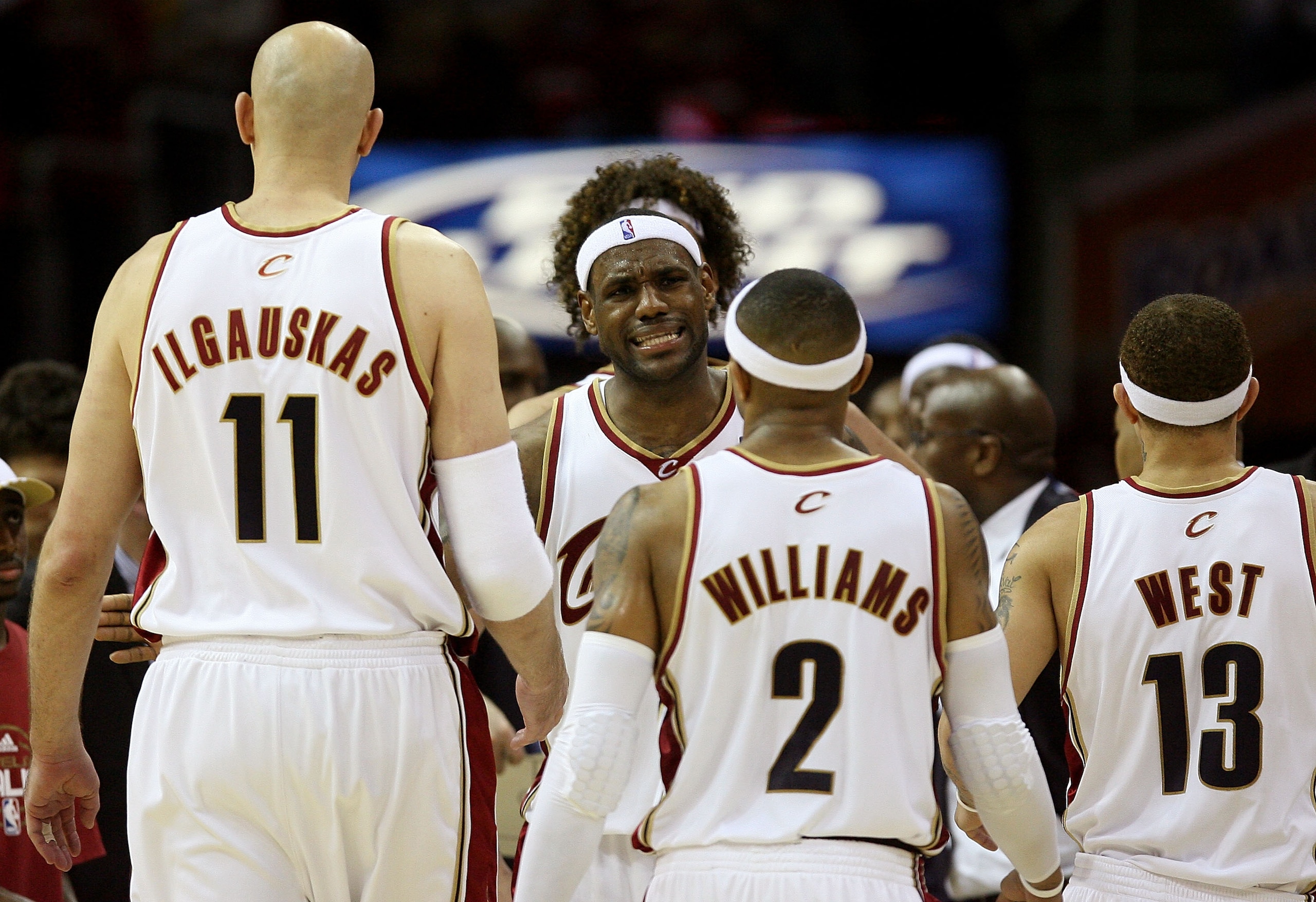 CLEVELAND - MAY 20:  LeBron James #23 reacts after a play with teammates Zydrunas Ilgauskas #11, Mo Williams #2 and Delonte West #13 of the Cleveland Cavaliers against the Orlando Magic in Game One of the Eastern Conference Finals during the 2009 Playoffs