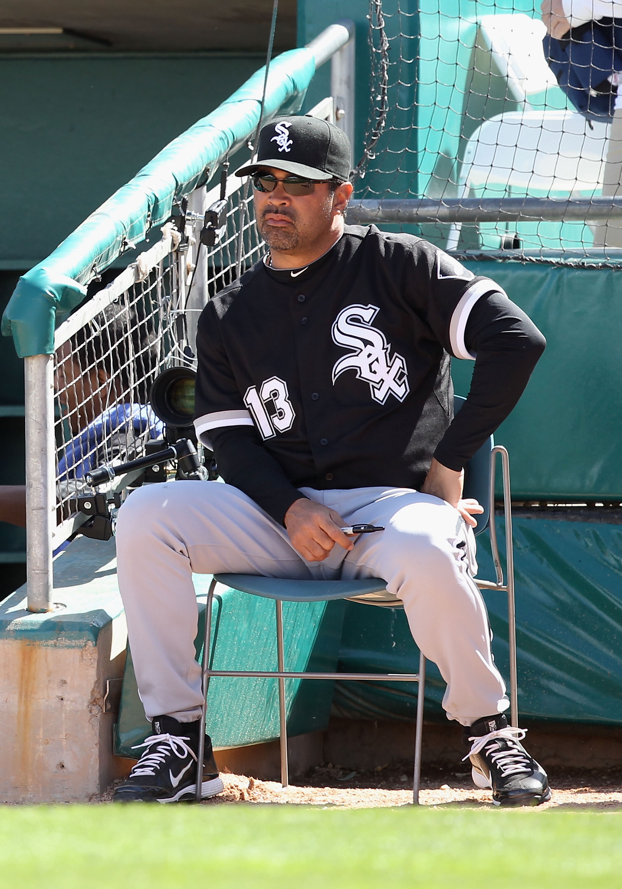 TUCSON, AZ - MARCH 07:  Manager Ozzie Guillen #13 of the Chicago White Sox during the spring training game against the Arizona Diamondbacks at Kino Veterans Memorial Stadium on March 7, 2011 in Tucson, Arizona.  (Photo by Christian Petersen/Getty Images)