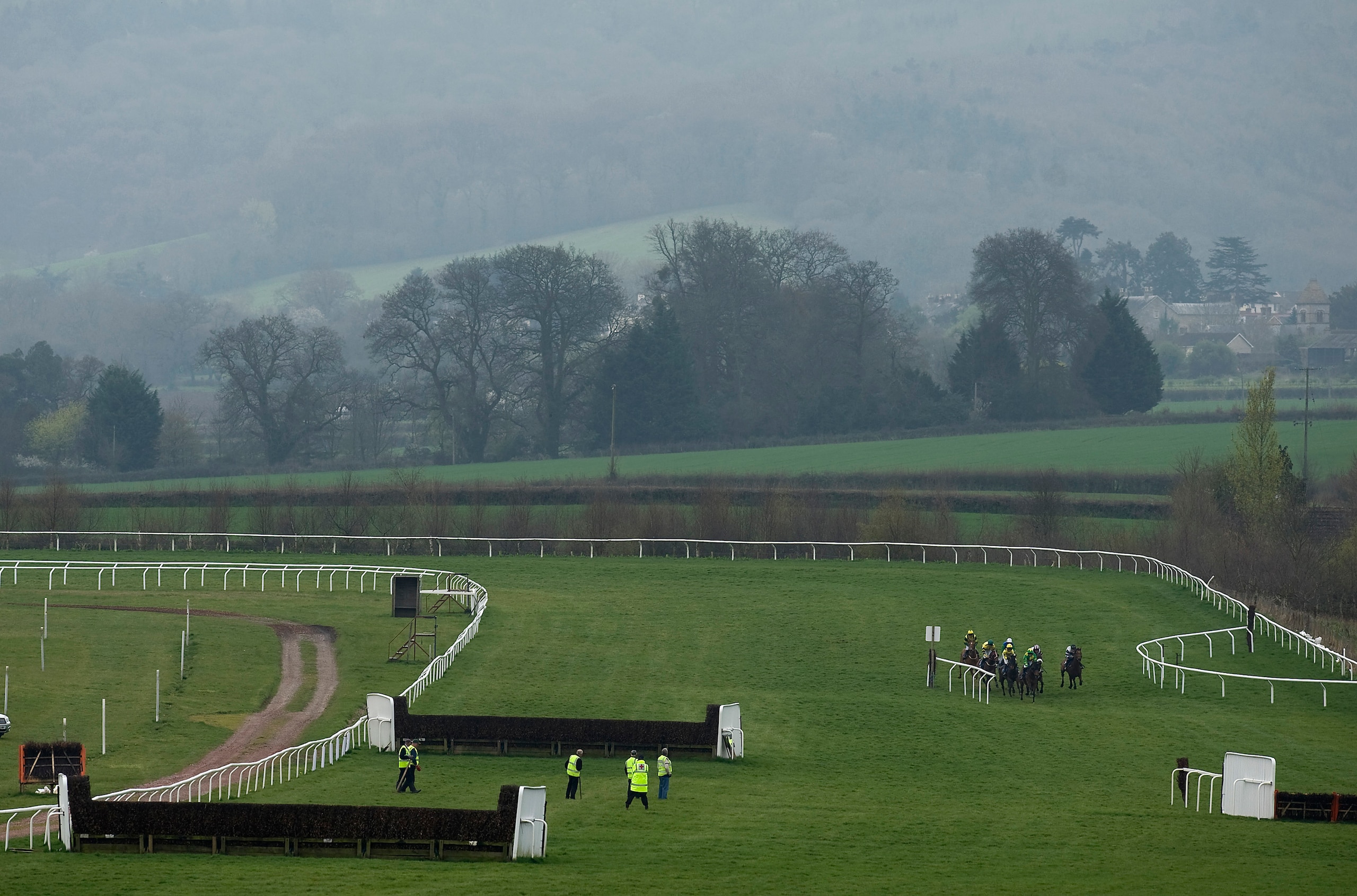 TAUNTON, ENGLAND - MARCH 29: Runners turn into the home straight in The SIS Live Handicap Hurdle Race at Taunton racecourse on March 29, 2011 in Taunton, England . (Photo by Alan Crowhurst/ Getty Images) TAUNTON, ENGLAND - MARCH 29: Runners turn into the home straight in The SIS Live Handicap Hurdle Race at Taunton racecourse on March 29, 2011 in Taunton, England . (Photo by Alan Crowhurst/ Getty Images)