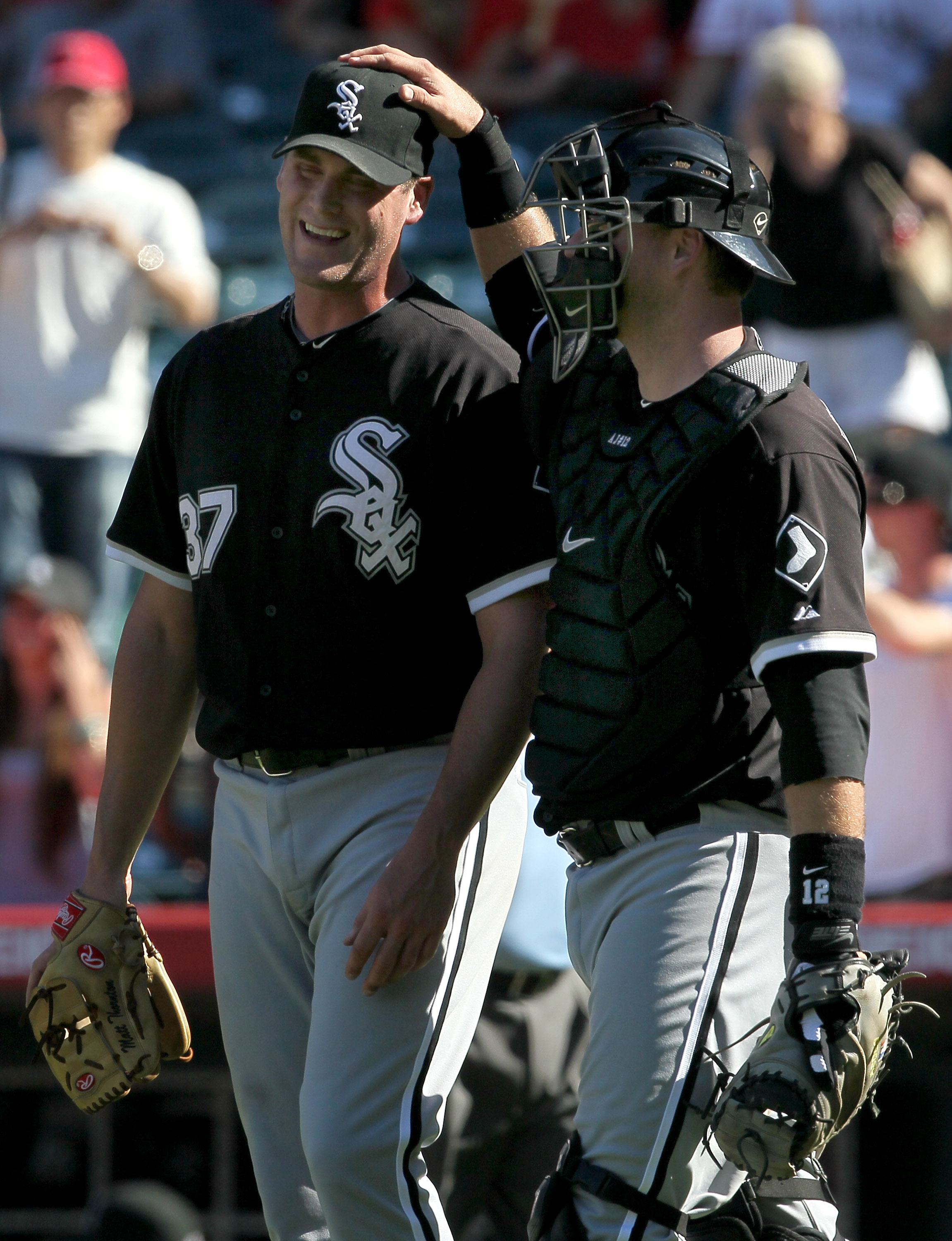 ANAHEIM, CA - SEPTEMBER 26:  Pitcher Matt Thornton #37 of the Chicago White Sox is greeted by catcher A.J. Pierzynski #12 after picking up the save against the Los Angeles Angels of Anaheim on September 26, 2010 at Angel Stadium in Anaheim, California. Th
