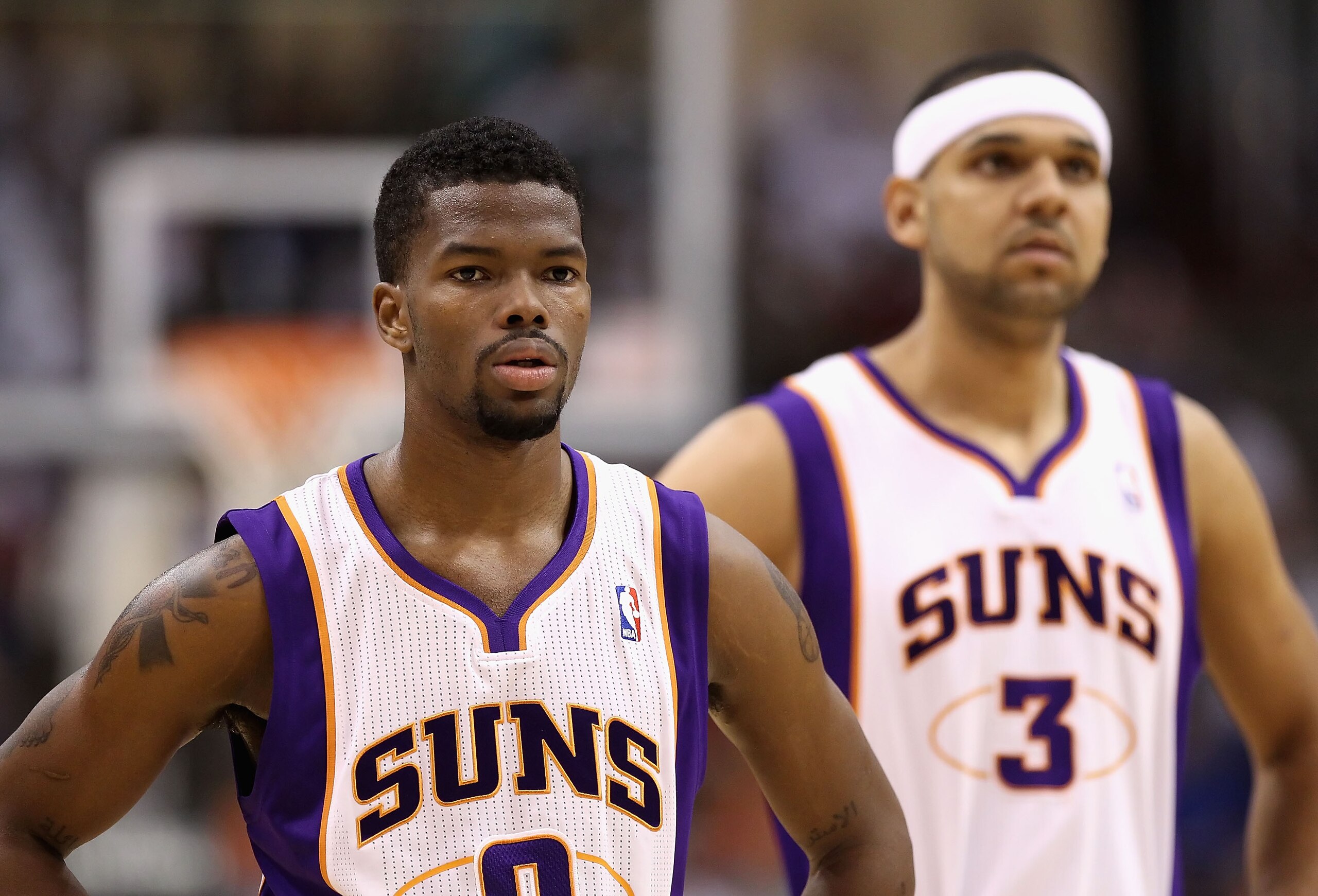 PHOENIX, AZ - MARCH 13:  Aaron Brooks #0 and Jared Dudley #3 of the Phoenix Suns watch a free throw shot during the NBA game against the Orlando Magic at US Airways Center on March 13, 2011 in Phoenix, Arizona. The Magic defeated the Suns 111-88. NOTE TO 