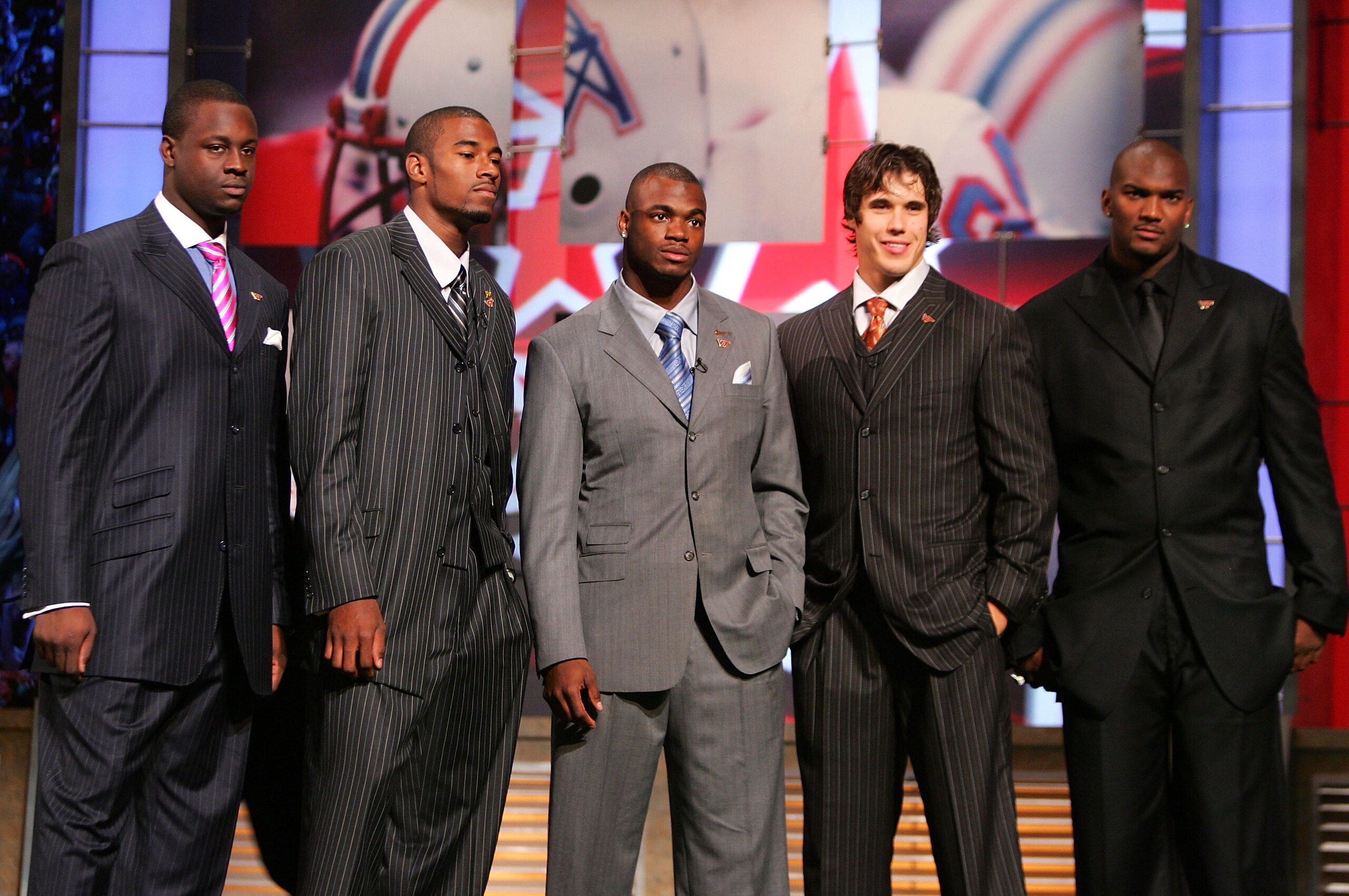 NEW YORK - APRIL 28:  Defensive end Gaines Adams of Clemson, wide receiver Calvin Johnson of Georgia Tech, running back Adrian Peterson of Oklahoma, quarterback Brady Quinn of Notre Dame, and quarterback JaMarcus Russell of Louisiana State University pose