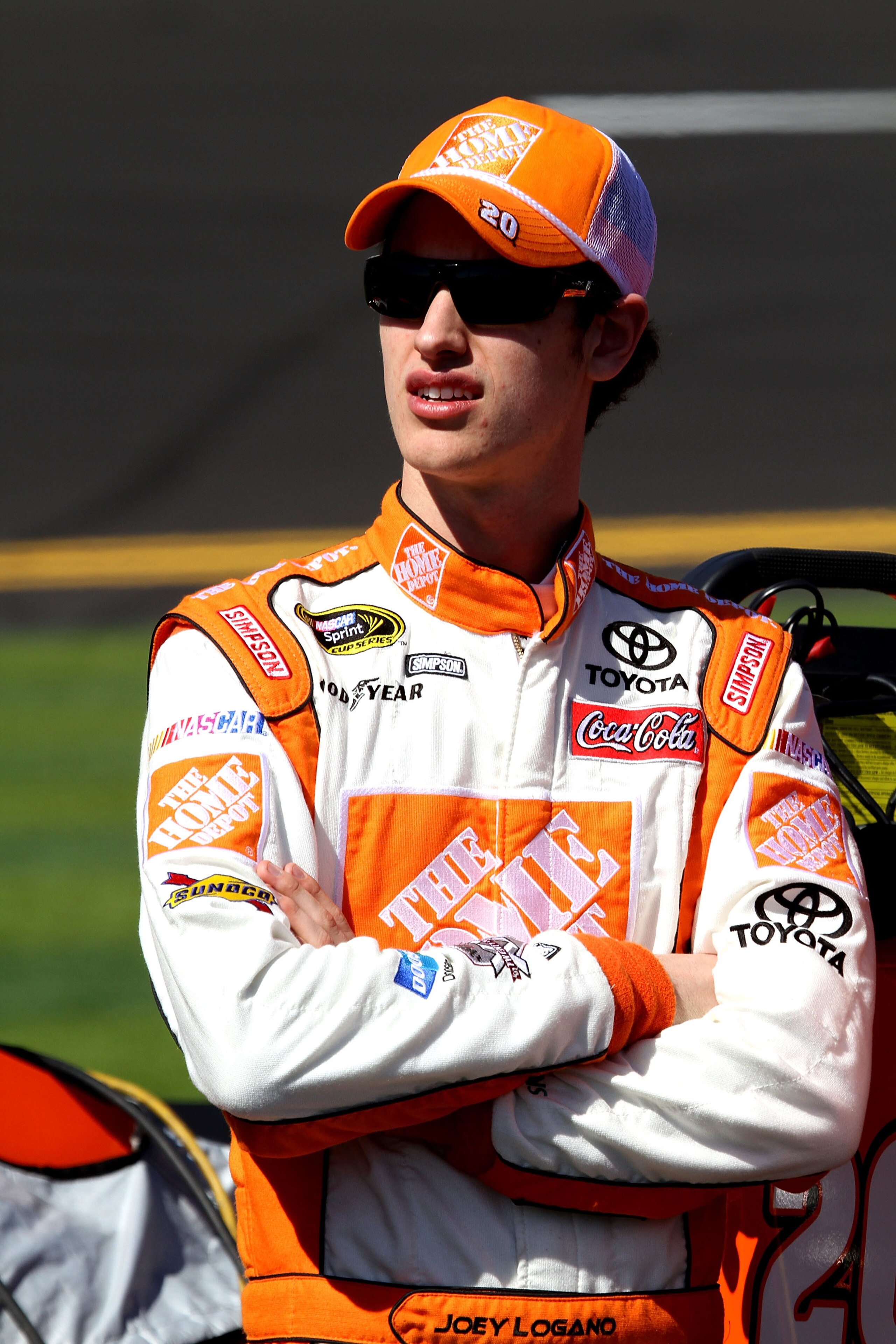 DAYTONA BEACH, FL - FEBRUARY 13:  Joey Logano, driver of the #20 Home Depot Toyota, looks on during qualifying for the NASCAR Sprint Cup Series Daytona 500 at Daytona International Speedway on February 13, 2011 in Daytona Beach, Florida.  (Photo by Jerry