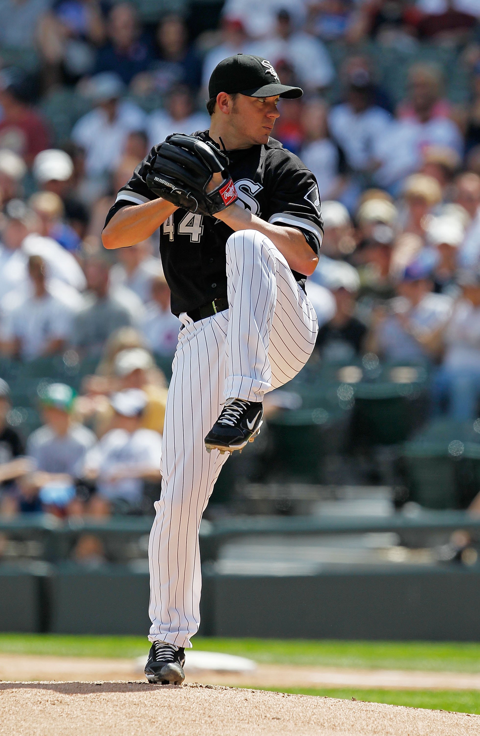 CHICAGO - JUNE 25: Starting pitcher Jake Peavy #44 of the Chicago White Sox delivers the ball against the Chicago Cubs at U.S. Cellular Field on June 25, 2010 in Chicago, Illinois. The White Sox defeated the Cubs 6-0. (Photo by Jonathan Daniel/Getty Image