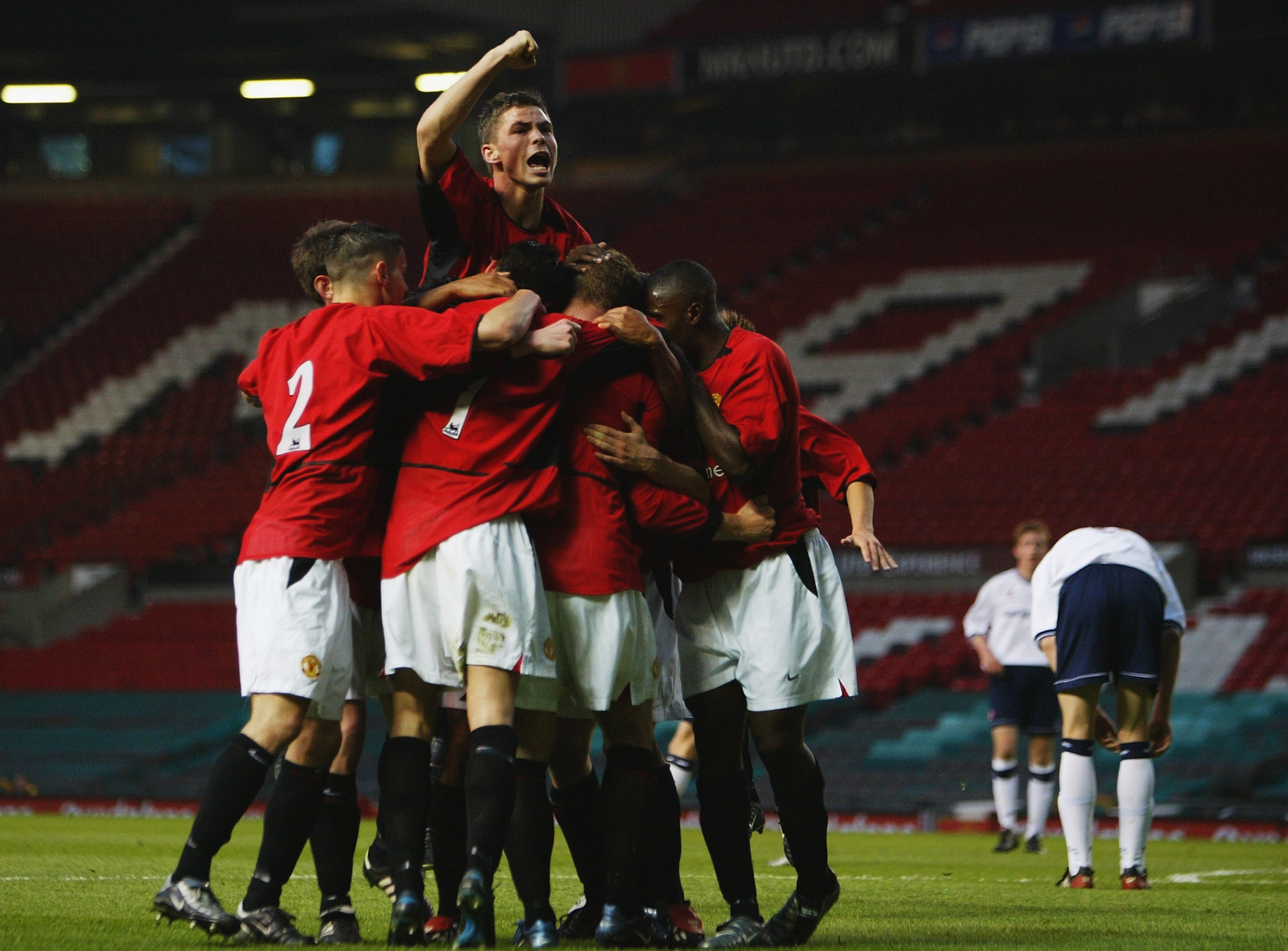 MANCHESTER - APRIL 25:  Manchester United youth players celebrate during the FA Youth Cup Final, second leg match between Manchester United and Middlesbrough on April 25, 2003 at Old Trafford in Manchester, England.  Manchester United won the final 3-1 on