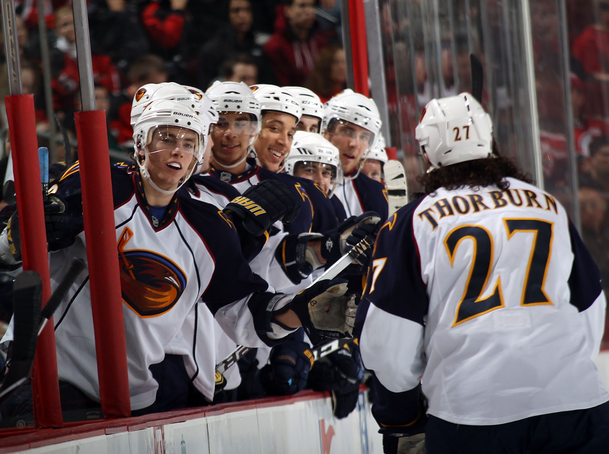 NEWARK, NJ - MARCH 15:  Chris Thorburn #27 of the Atlanta Thrashers celebrates his goal at 16:29 of the first period against the New Jersey Devils at the Prudential Center on March 15, 2011 in Newark, New Jersey.  (Photo by Bruce Bennett/Getty Images)