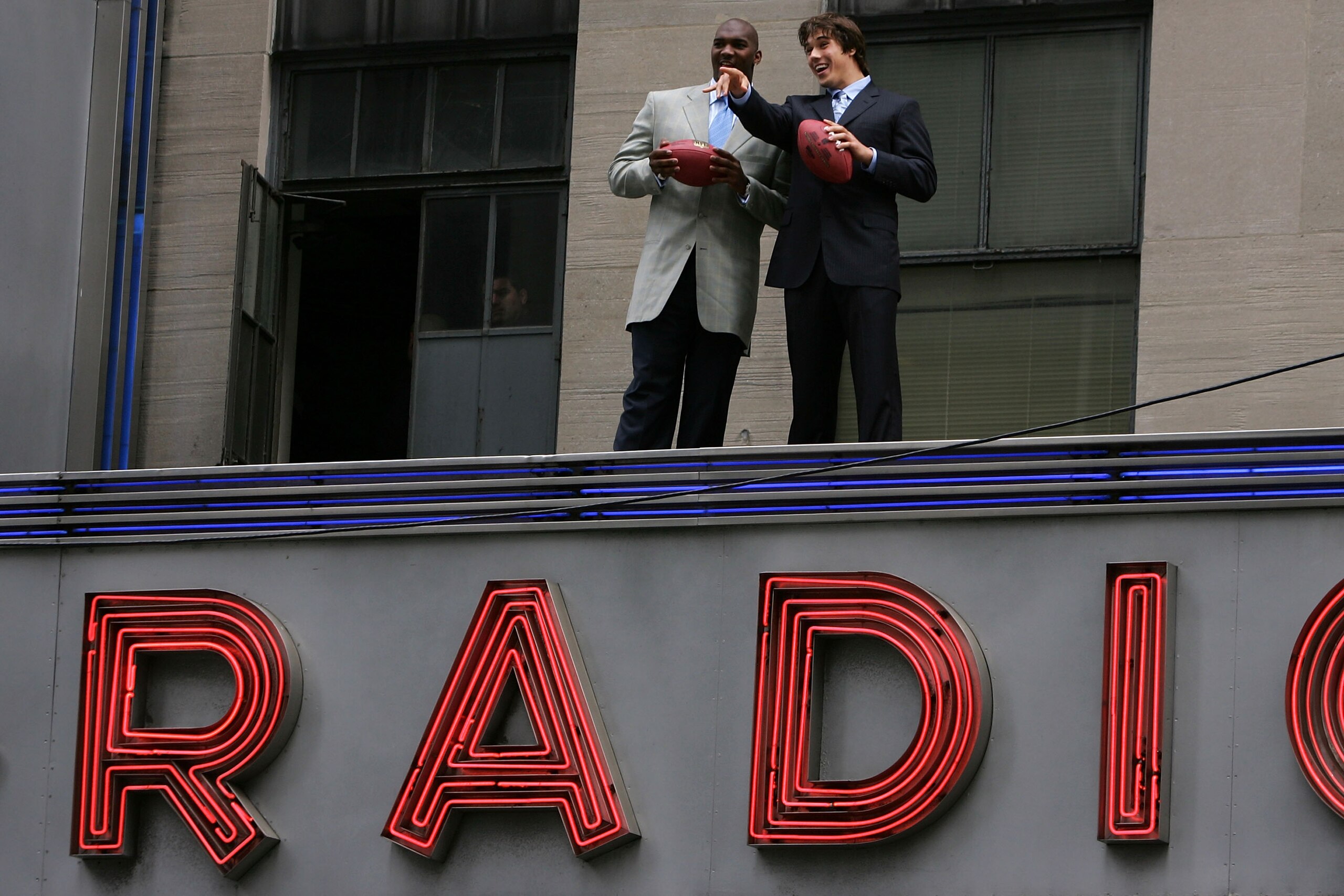 NEW YORK - APRIL 26:  (L-R)  Quarterback JaMarcus Russell of Louisiana State University and quarterback Brady Quinn of Notre Dame University pose on the Radio City Music Hall Marquee during the NFL Draft photo call held at Radio City Music Hall on April 2