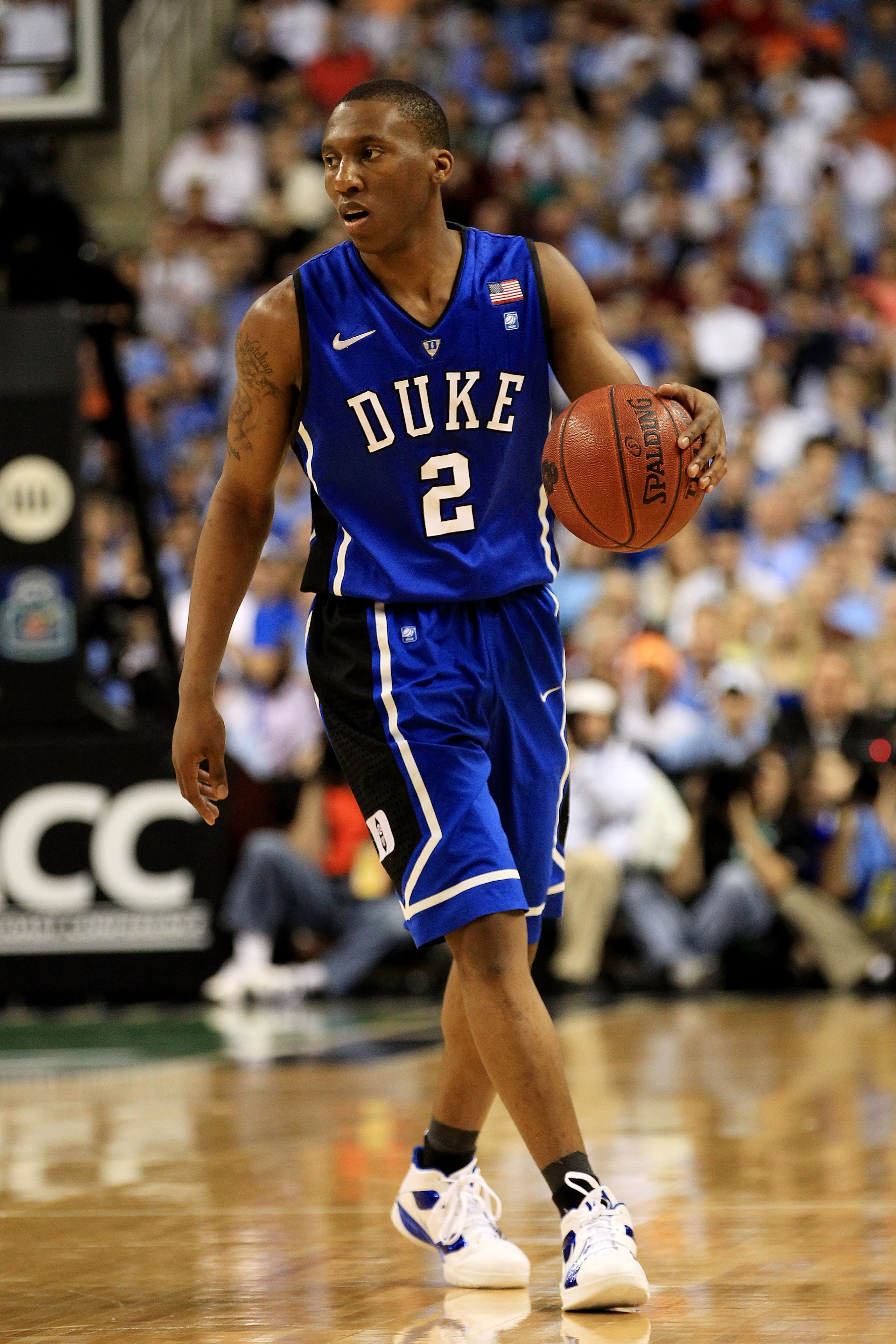 GREENSBORO, NC - MARCH 13:  Nolan Smith #2 of the Duke Blue Devils brings the ball up the court during the first half of the game against the North Carolina Tar Heels in the championship game of the 2011 ACC men's basketball tournament at the Greensboro C