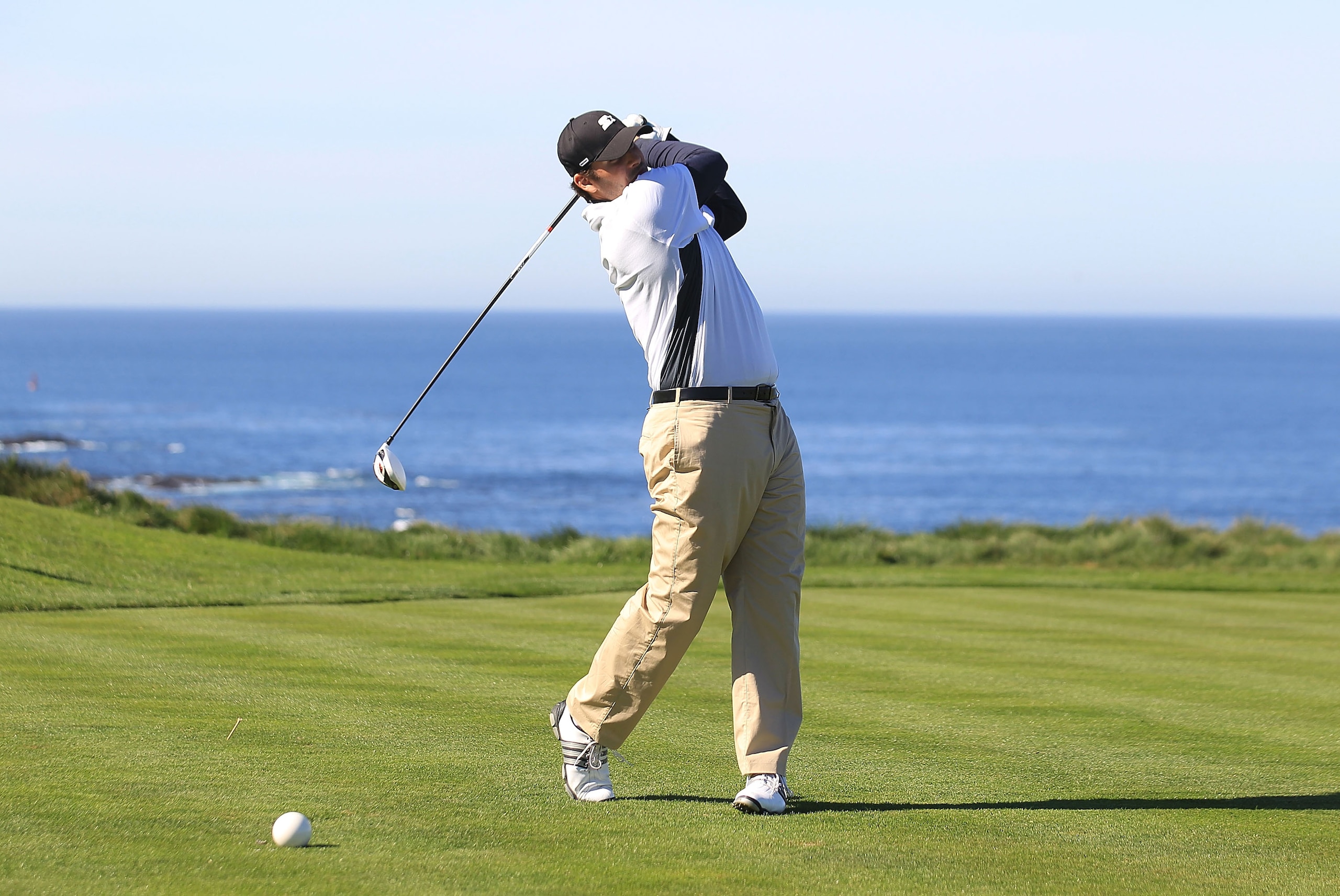 PEBBLE BEACH, CA - FEBRUARY 11:  Professional football player Tony Romo hits from the sixth tee box at the AT&T Pebble Beach National Pro-Am- Round Two at the Spyglass golf club on February 11, 2011 in Pebble Beach, California.  (Photo by Jed Jacobsohn/Ge