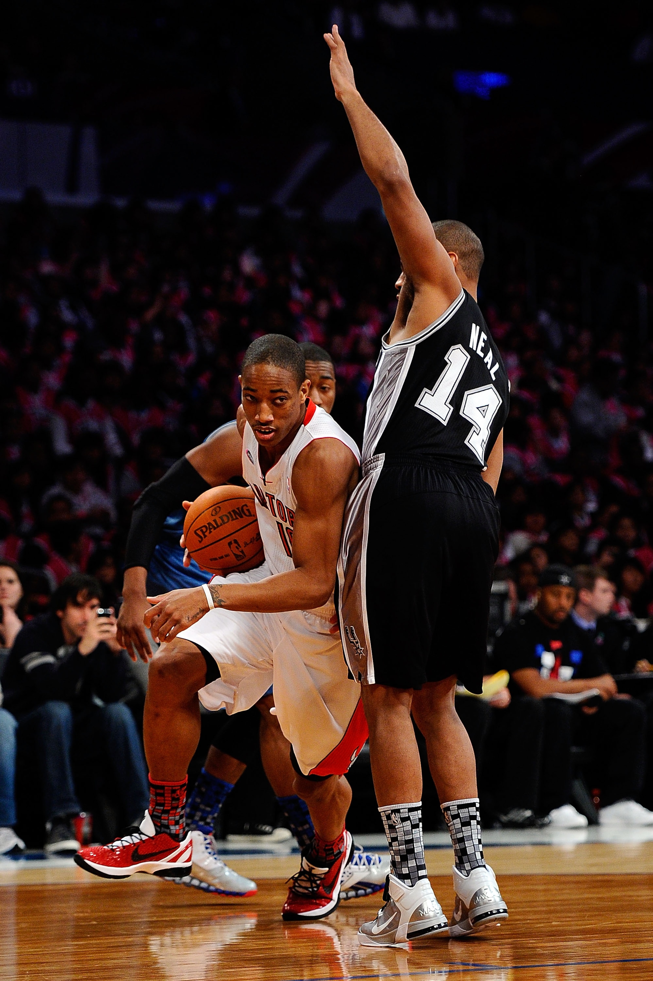 LOS ANGELES, CA - FEBRUARY 18:  DeMar DeRozan #10 of the Toronto Raptors and the Sophomore Team drives on Gary Neal #14 of the San Antonio Spurs and the Rookie Team during the T-Mobile Rookie Challenge and Youth Jam at Staples Center on February 18, 2011