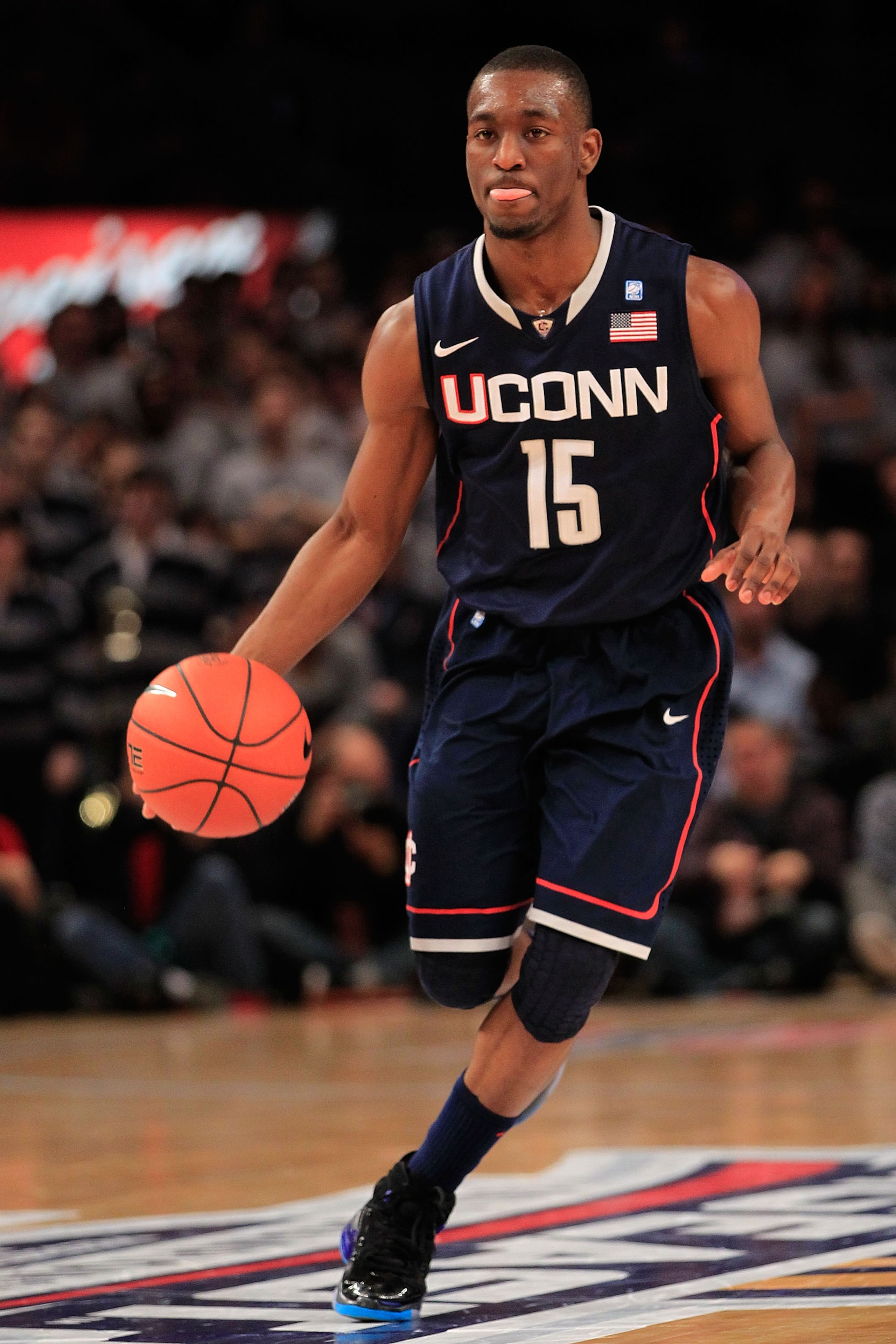 NEW YORK, NY - MARCH 09:  Kemba Walker #15 of the Connecticut Huskies dribbles the ball against the Georgetown Hoyas during the second round of the 2011 Big East Men's Basketball Tournament presented by American Eagle Outfitters at Madison Square Garden o