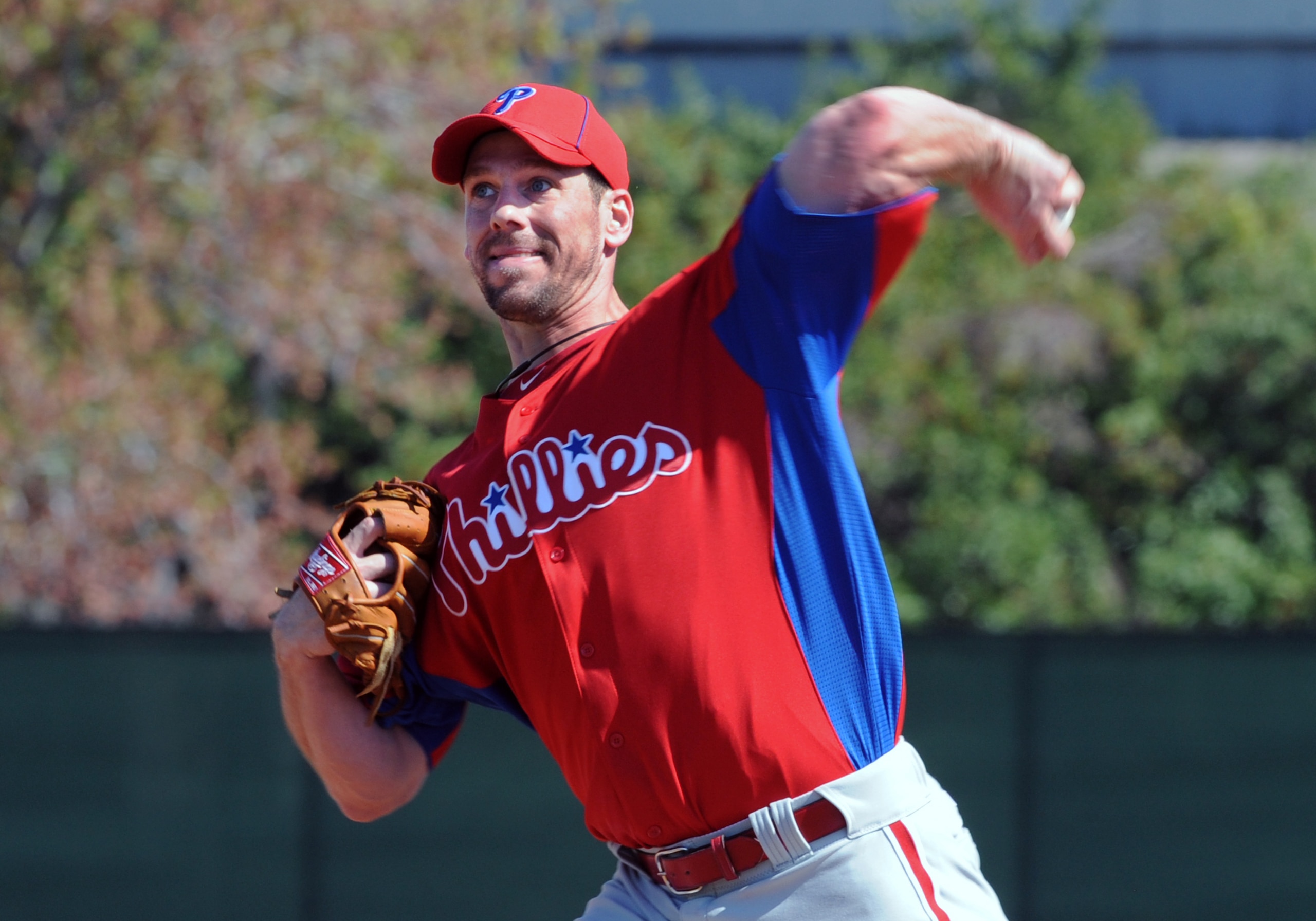 CLEARWATER, FL - FEBRUARY 19: Pitcher Cliff Lee #33 of the Philadelphia Phillies throws from the mound during a spring training workout February 19, 2011 the Carpenter Complex at Bright House Field in Clearwater, Florida. (Photo by Al Messerschmidt/Getty 
