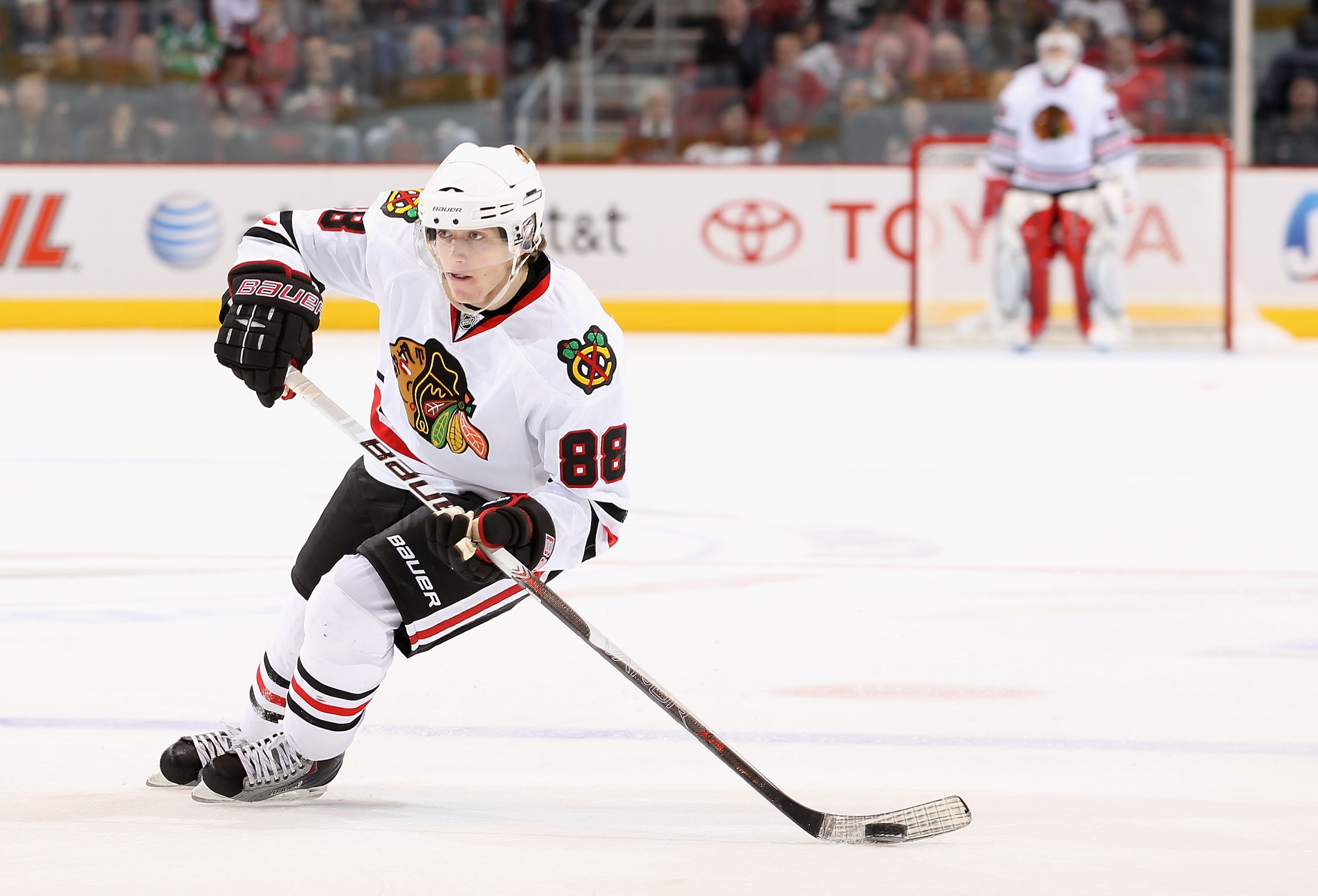 GLENDALE, AZ - FEBRUARY 12:  Patrick Kane #88 of the Chicago Blackhawks skates with the puck during the NHL game against the Phoenix Coyotes at Jobing.com Arena on February 12, 2011 in Glendale, Arizona.  The Coyotes defeated the Blackhawks 3-2 in an over