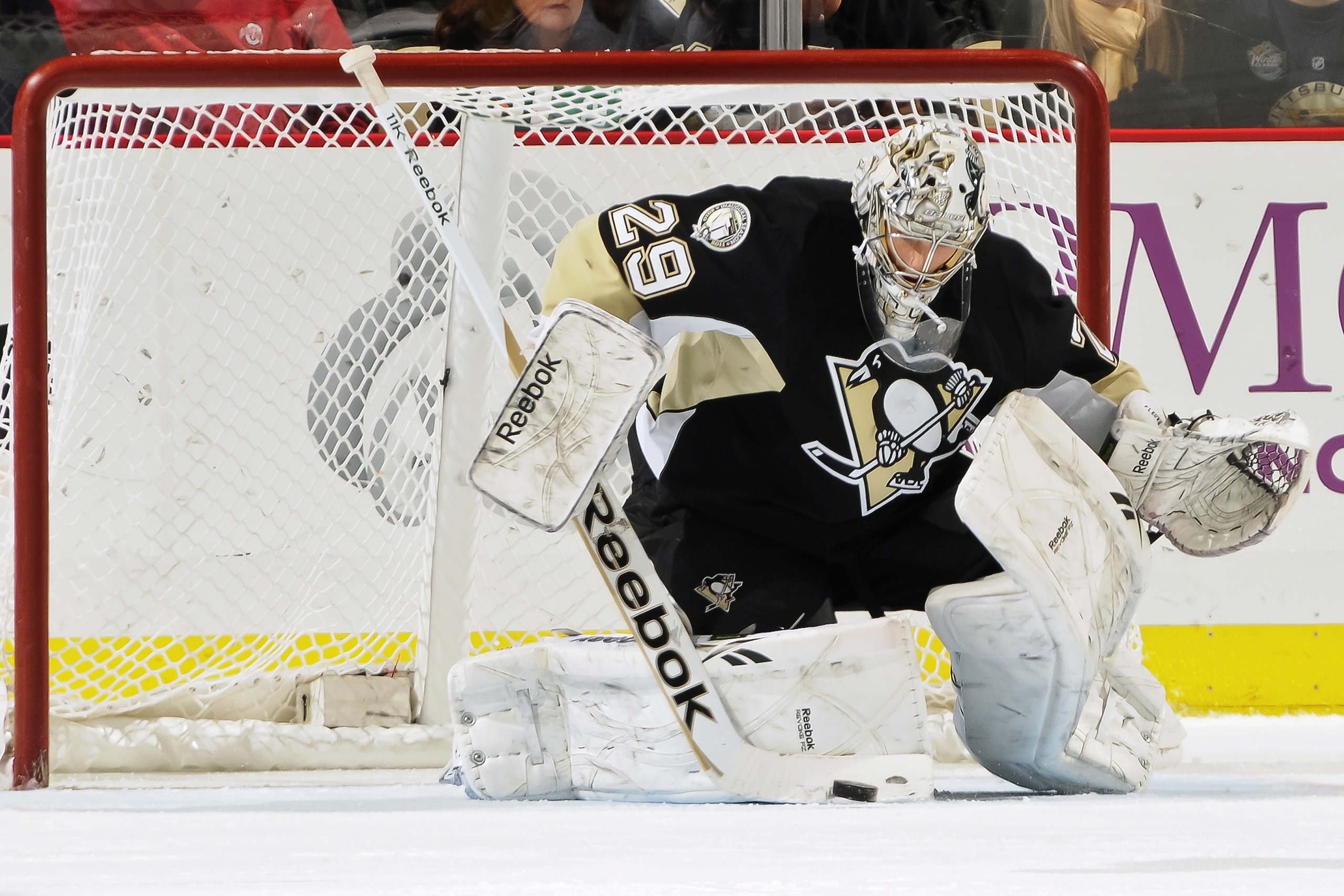 PITTSBURGH, PA - FEBRUARY 8:  Goaltender Marc-Andre Fleury #29 of the Pittsburgh Penguins makes a save against the Columbus Blue Jackets on February 8, 2011 at CONSOL Energy Center in Pittsburgh, Pennsylvania.  (Photo by Jamie Sabau/Getty Images)