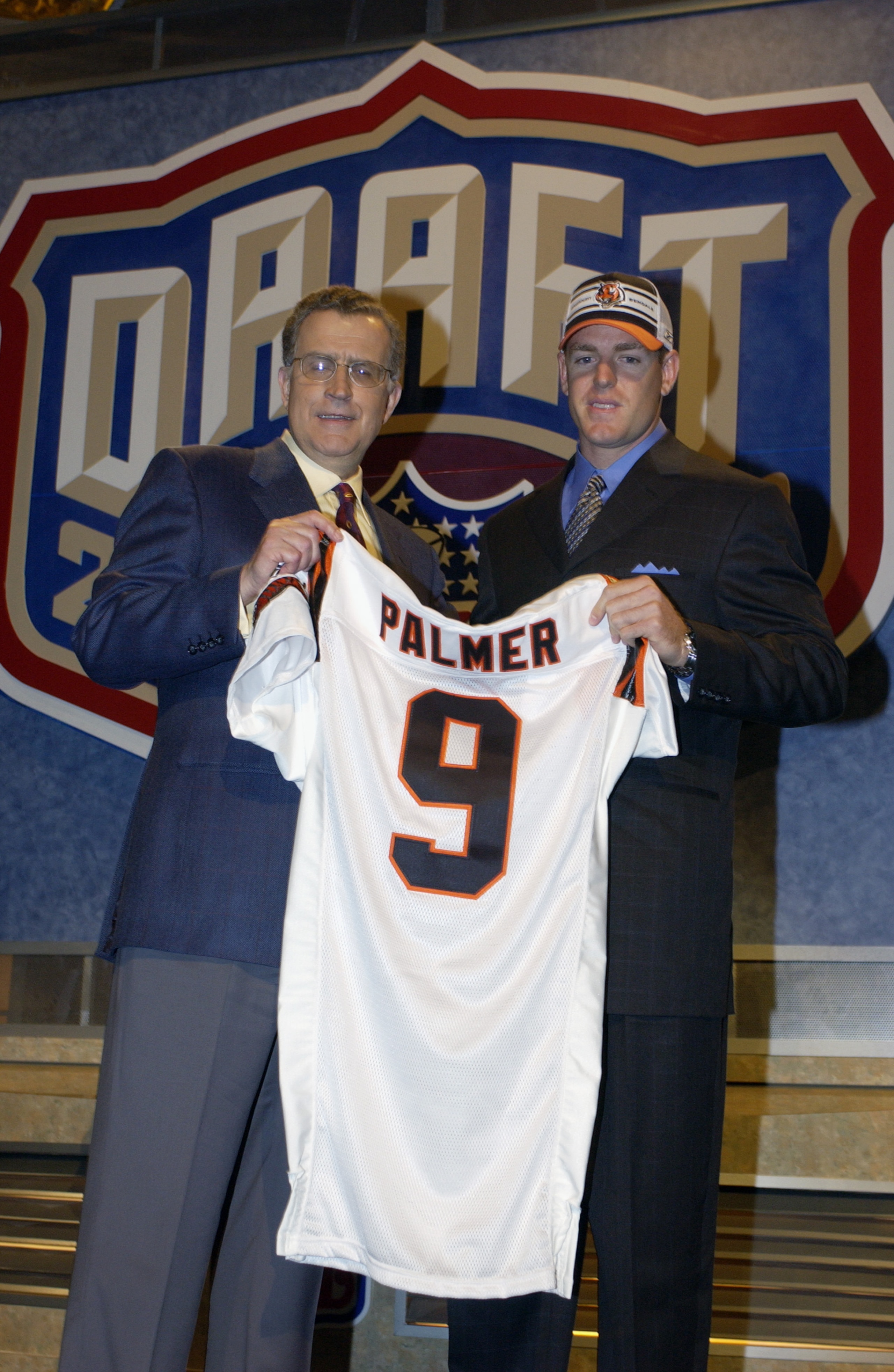 NEW YORK CITY - APRIL 26:  Carson Palmer from USC after being selected first by the Cincinnati Bengals with NFL Commissioner Paul Tagliabue at the 2003 NFL Draft on April 26, 2003 at Madison Square Garden in New York City. Palmer agreed to a $40 million/s