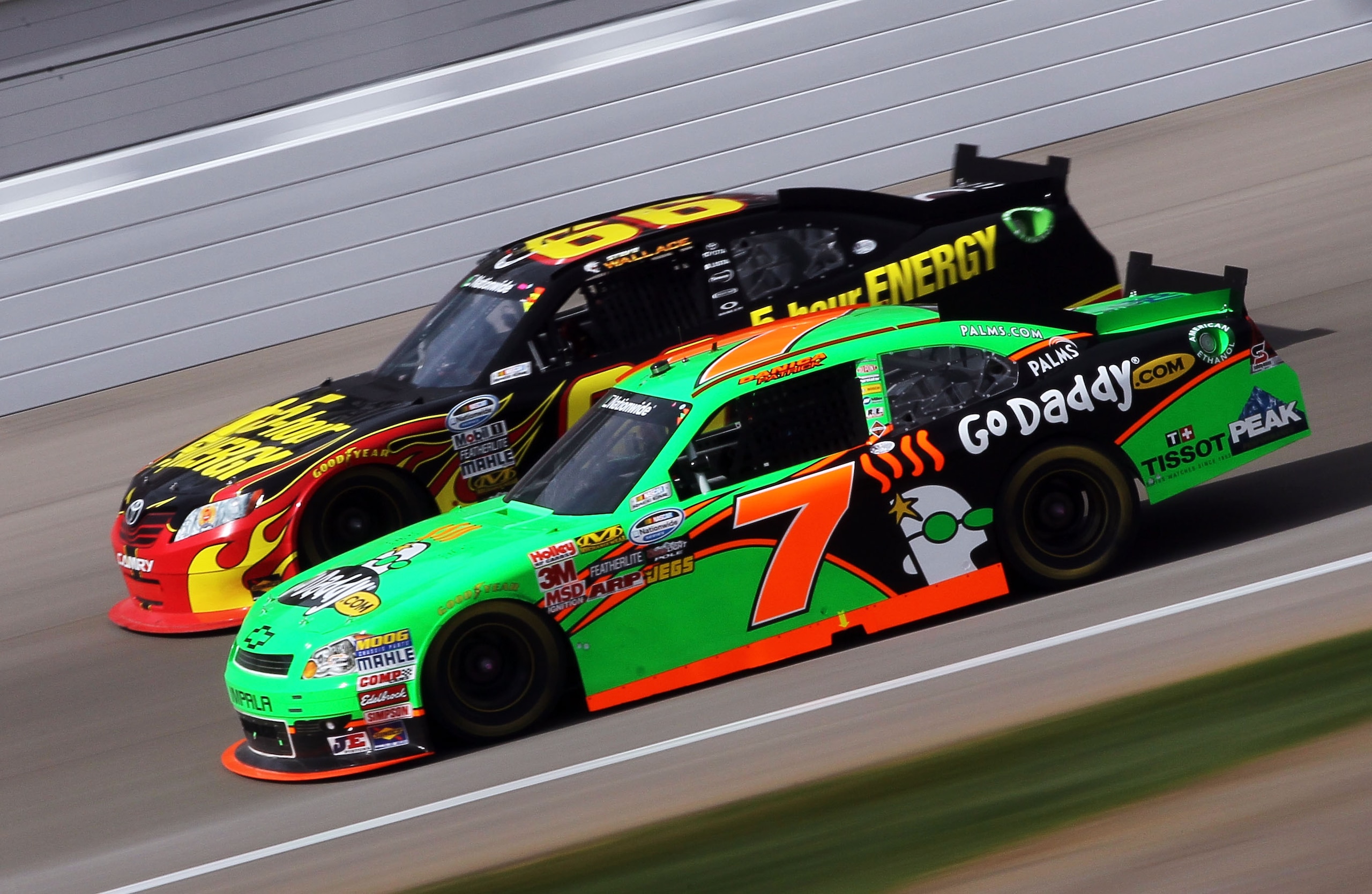 LAS VEGAS, NV - MARCH 05:  Danica Patrick, driver of the #7 GoDaddy.com Chevrolet, races Steve Wallace, driver of the #66 5-Hour Energy Toyota, during the NASCAR Nationwide Series Sam's Town 300 at Las Vegas Motor Speedway on March 5, 2011 in Las Vegas, N