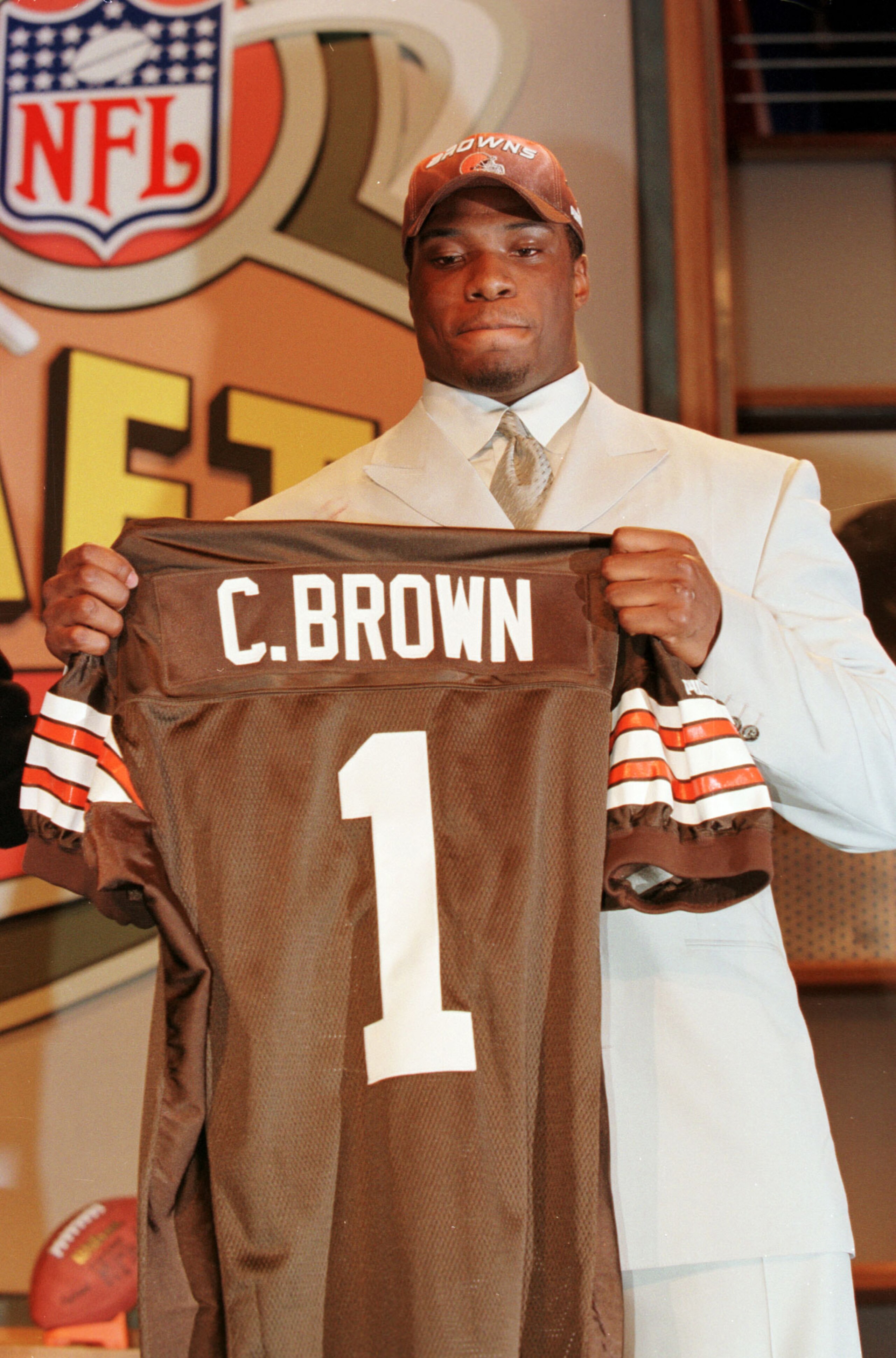 15 Apr 2000:   Courtney Brown holds up a Brown''s jersey after Cleveland made him the number one pick in the 2000 NFL Draft at the Paramount Theater at Madison Square Garden in New York, New York. Mandatory Credit: M. David Leeds/ALLSPORT