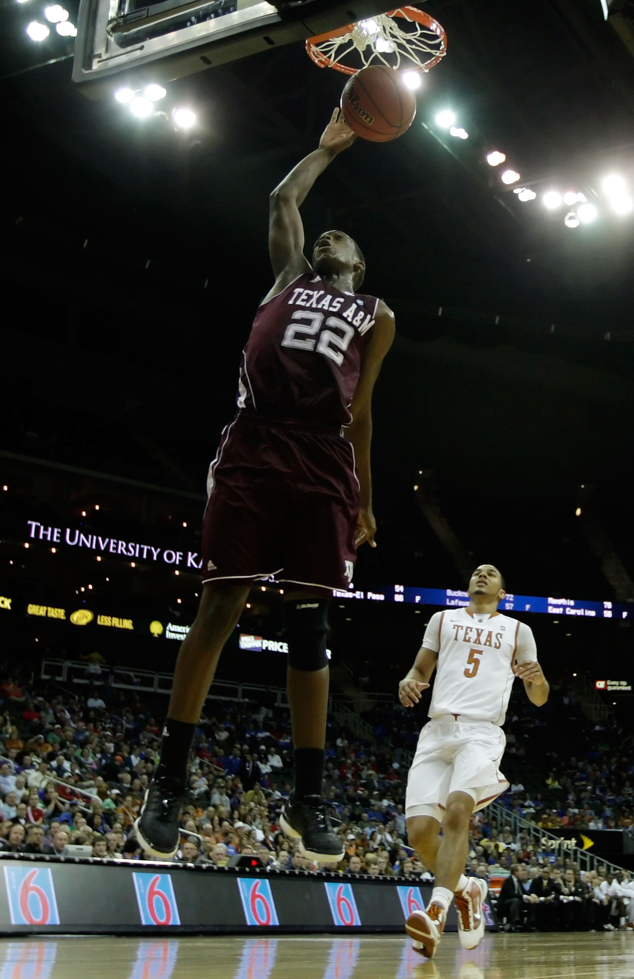 KANSAS CITY, MO - MARCH 11:  Khris Middleton #22 of the Texas A&M Aggies dunks the ball against the Texas Longhorns during their semifinal game in the 2011 Phillips 66 Big 12 Men's Basketball Tournament at Sprint Center on March 11, 2011 in Kansas City, M