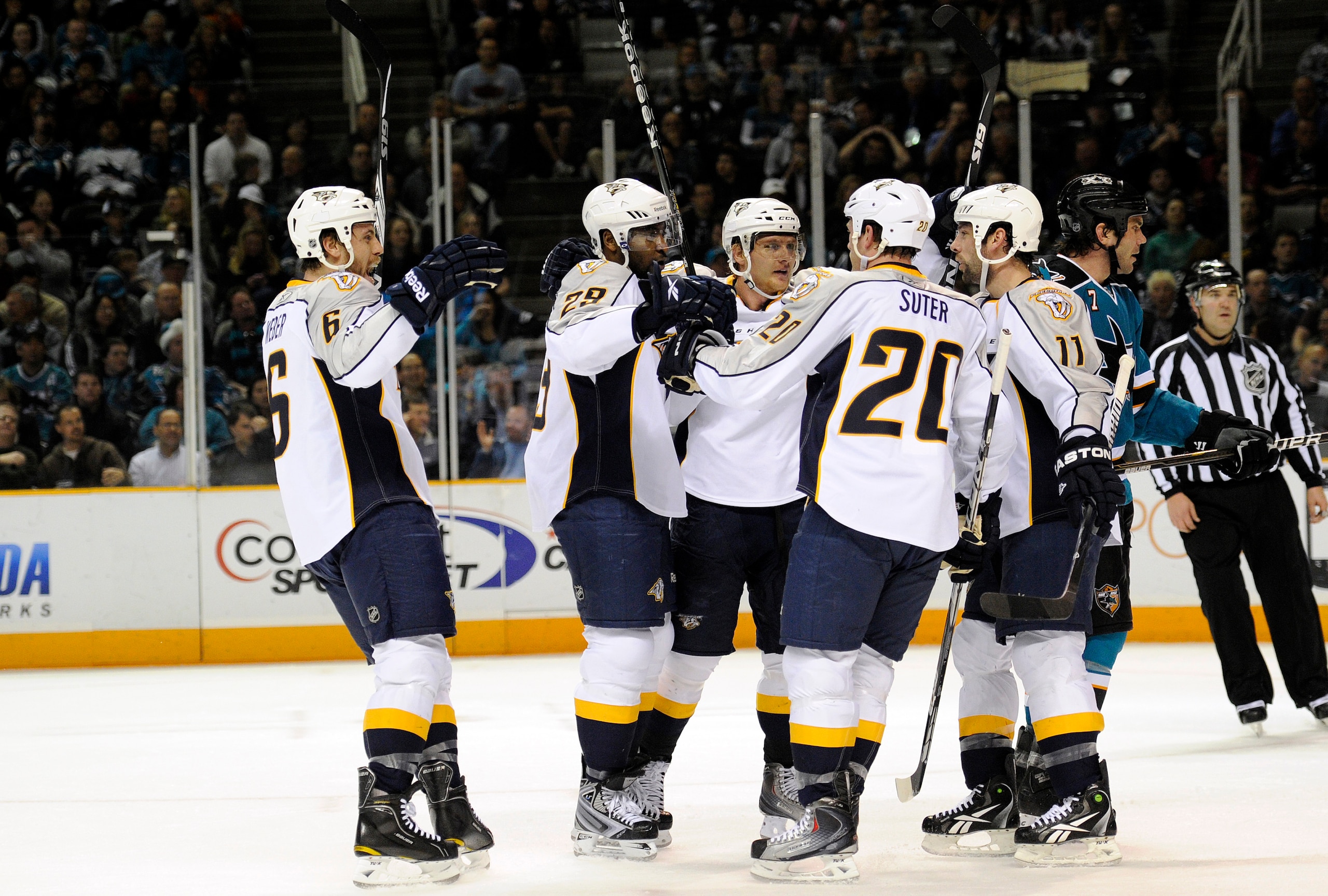 SAN JOSE, CA - MARCH 8: Joel Ward #29 of the Nashville Predators celebrates with teammates Ryan Suter #20, Shea Weber #6, and David Legwand #11 after scoring a power play goal against the San Jose Sharks in the first period of an NHL hockey game at the HP