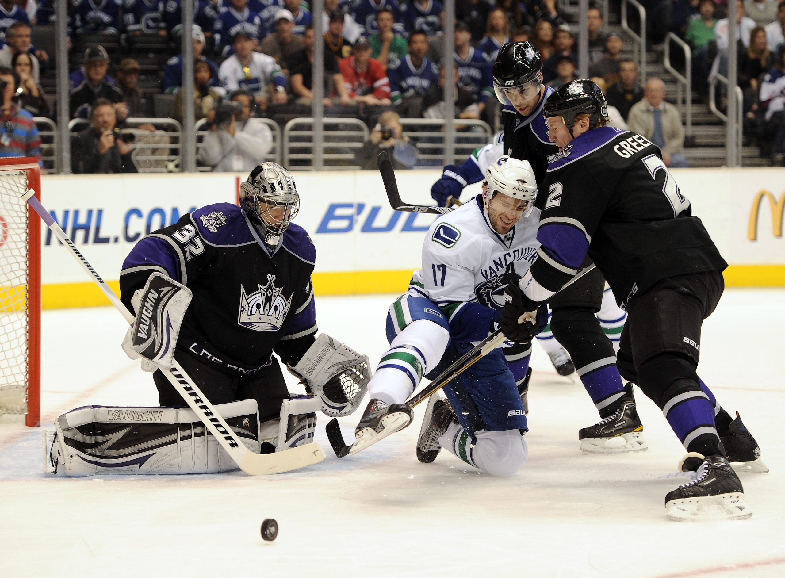 LOS ANGELES, CA - MARCH 05:  Ryan Kesler #17 of the Vancouver Canucks attempts a shot in front of Jonathan Quick #32, Matt Greene #2 and Alec Martinez #53 of the Los Angeles Kings for during the first period at the Staples Center on March 5, 2011 in Los A