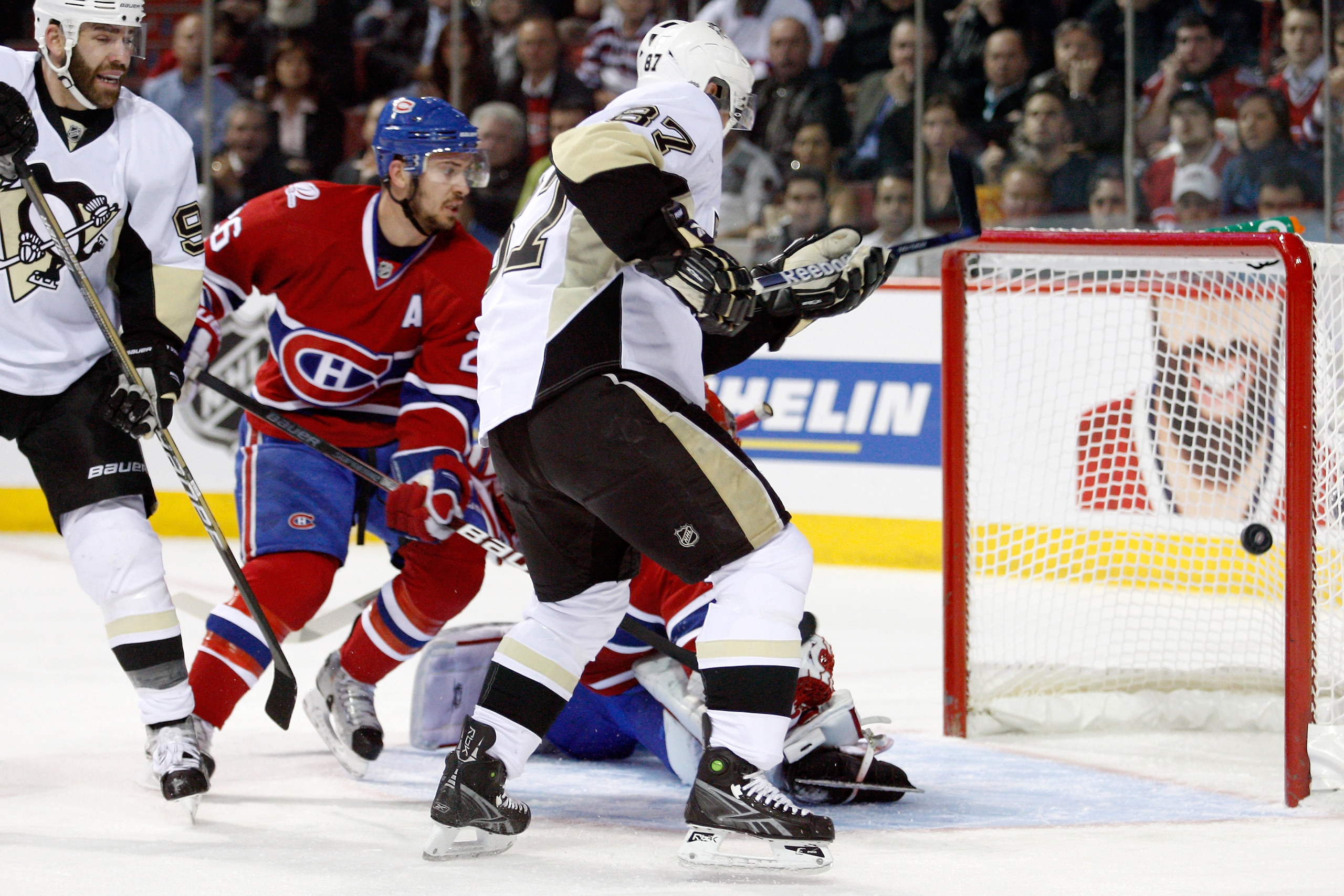 MONTREAL- MAY 10:  Sidney Crosby #87 of the Pittsburgh Penguins scores a goal on Jaroslav Halak #41 of the Montreal Canadiens in Game Six of the Eastern Conference Semifinals during the 2010 NHL Stanley Cup Playoffs at the Bell Centre on May 10, 2010 in M
