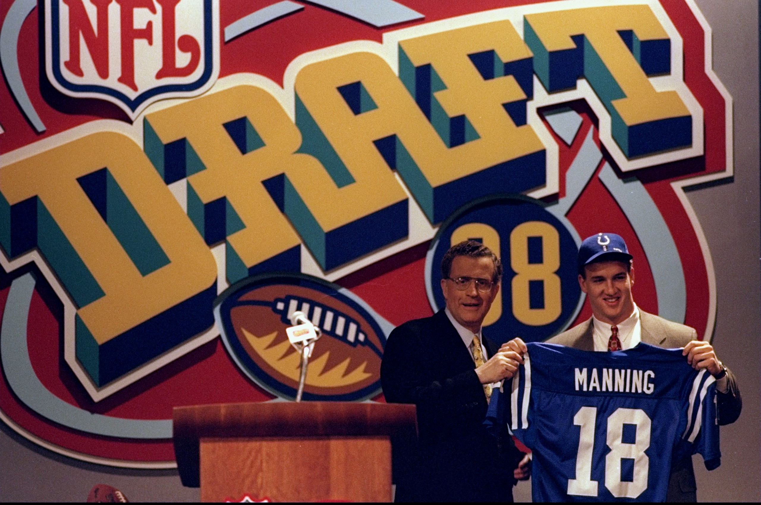 18 Apr 1998:  Quarterback Peyton Manning stands with NFL Commissioner Paul Tagliabue during the NFL draft at Madison Square Garden in New York City, New York. Mandatory Credit: Jamie Squire  /Allsport
